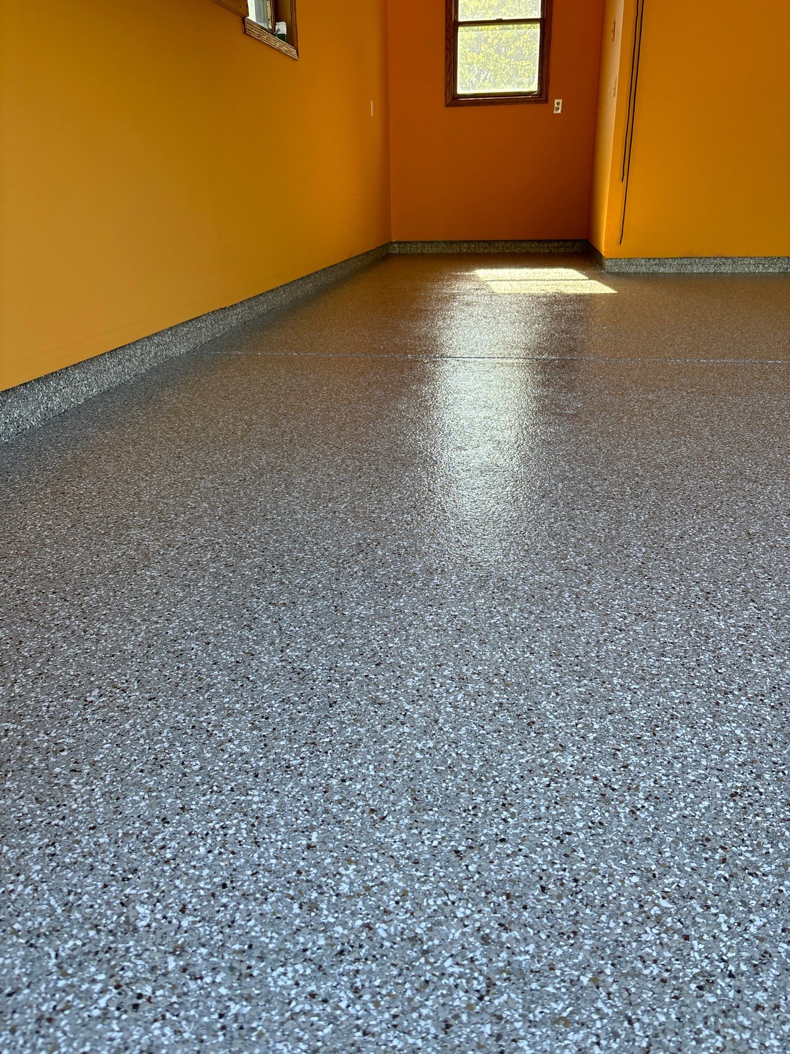 Bring REVIVAL to Your Garage by Revival Concrete Coatings