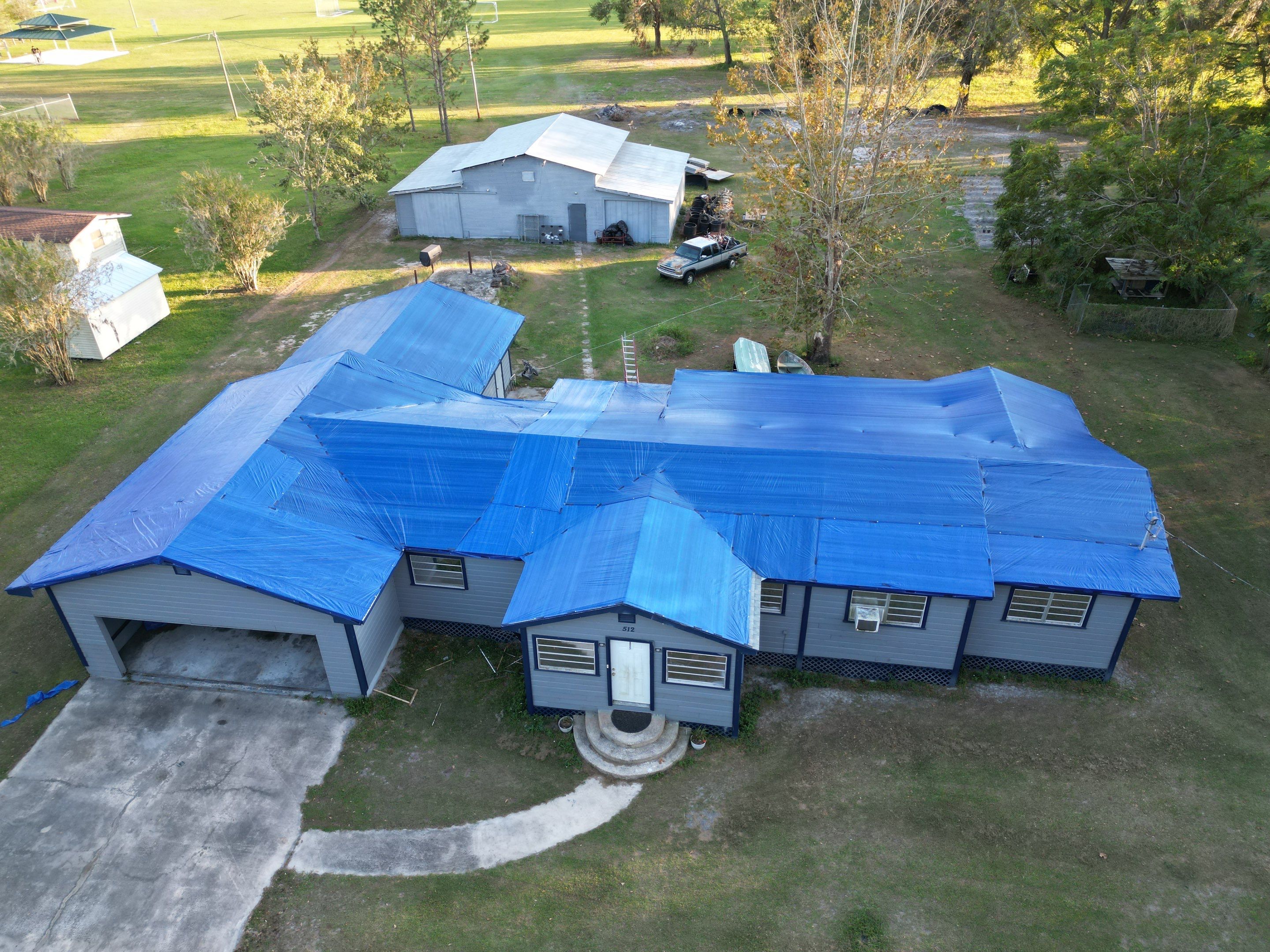 Tarp using TARP BLUE by V General Contractors 
