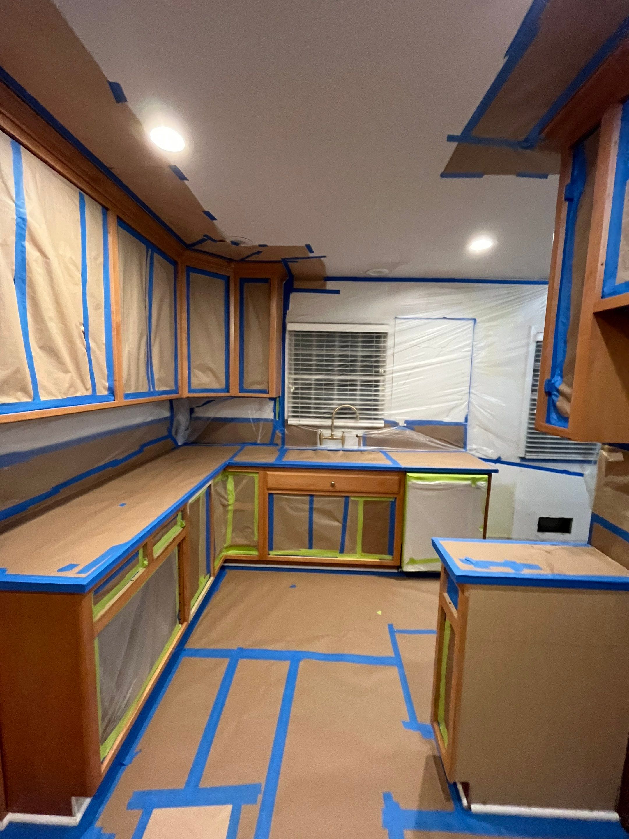 Elegant Transformation: Stained Cabinets Revamped with Sherwin-Williams Juniper by Cougar Painting