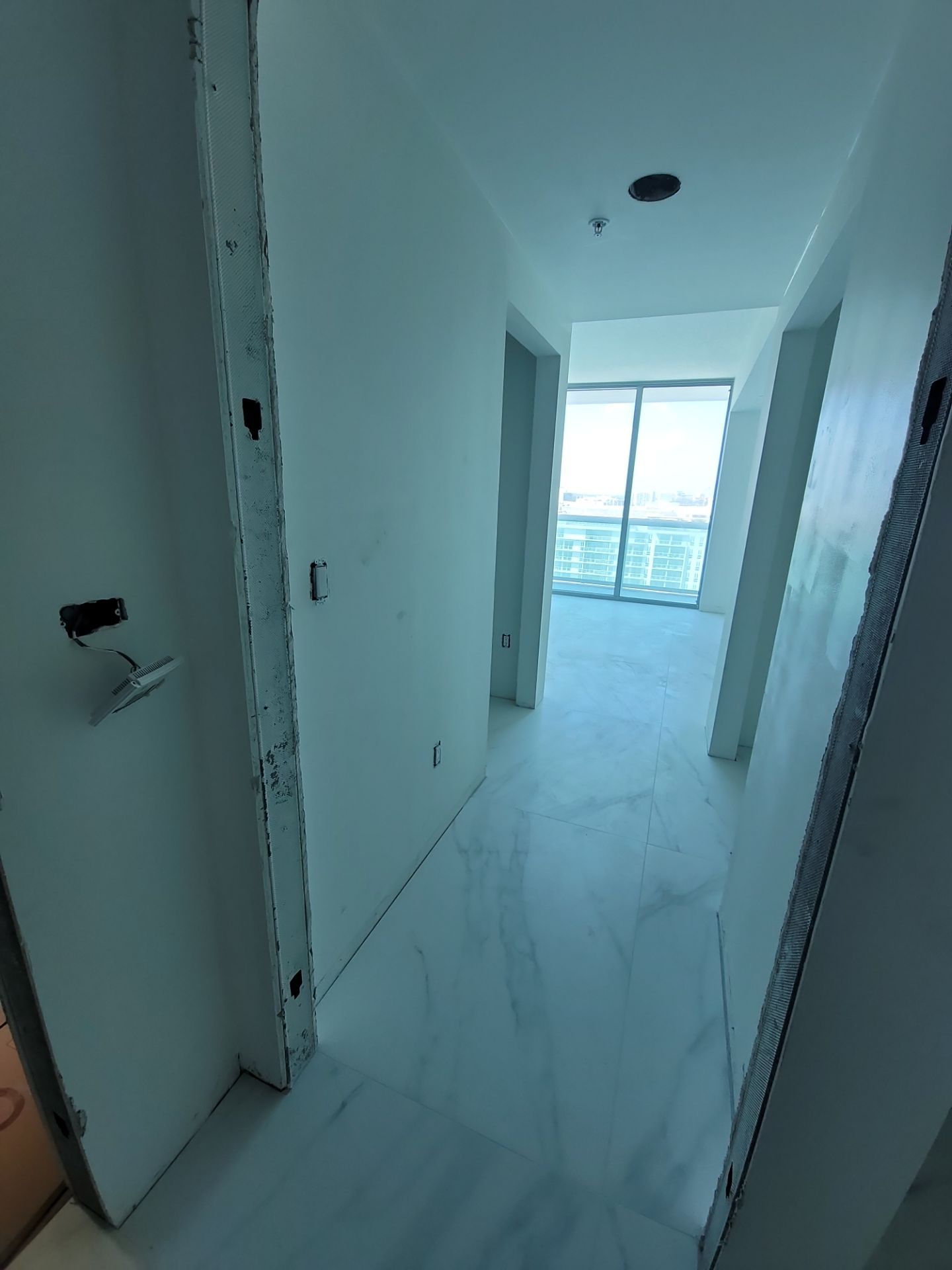 Modern High-Rise Interior Renovation and Custom Tile Installation in Miami by Picos Construction Engineering