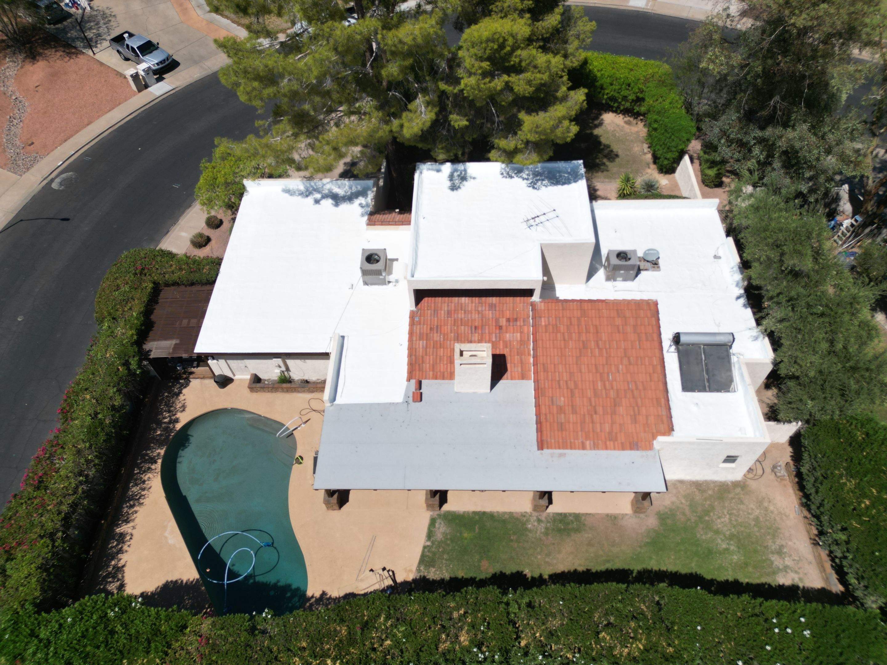Re-coat & Tile Job by All Storm Roofing & Construction