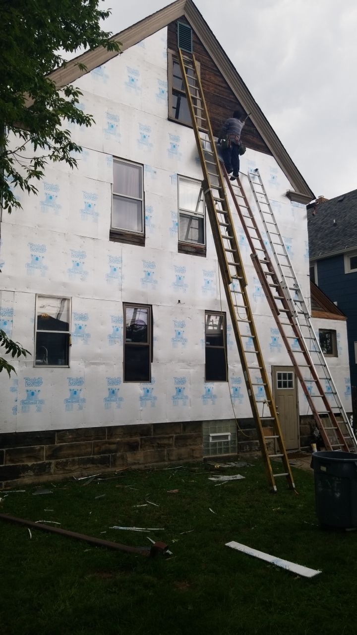 James Hardie Siding on Antique Home by Absolute Roofing and Construction