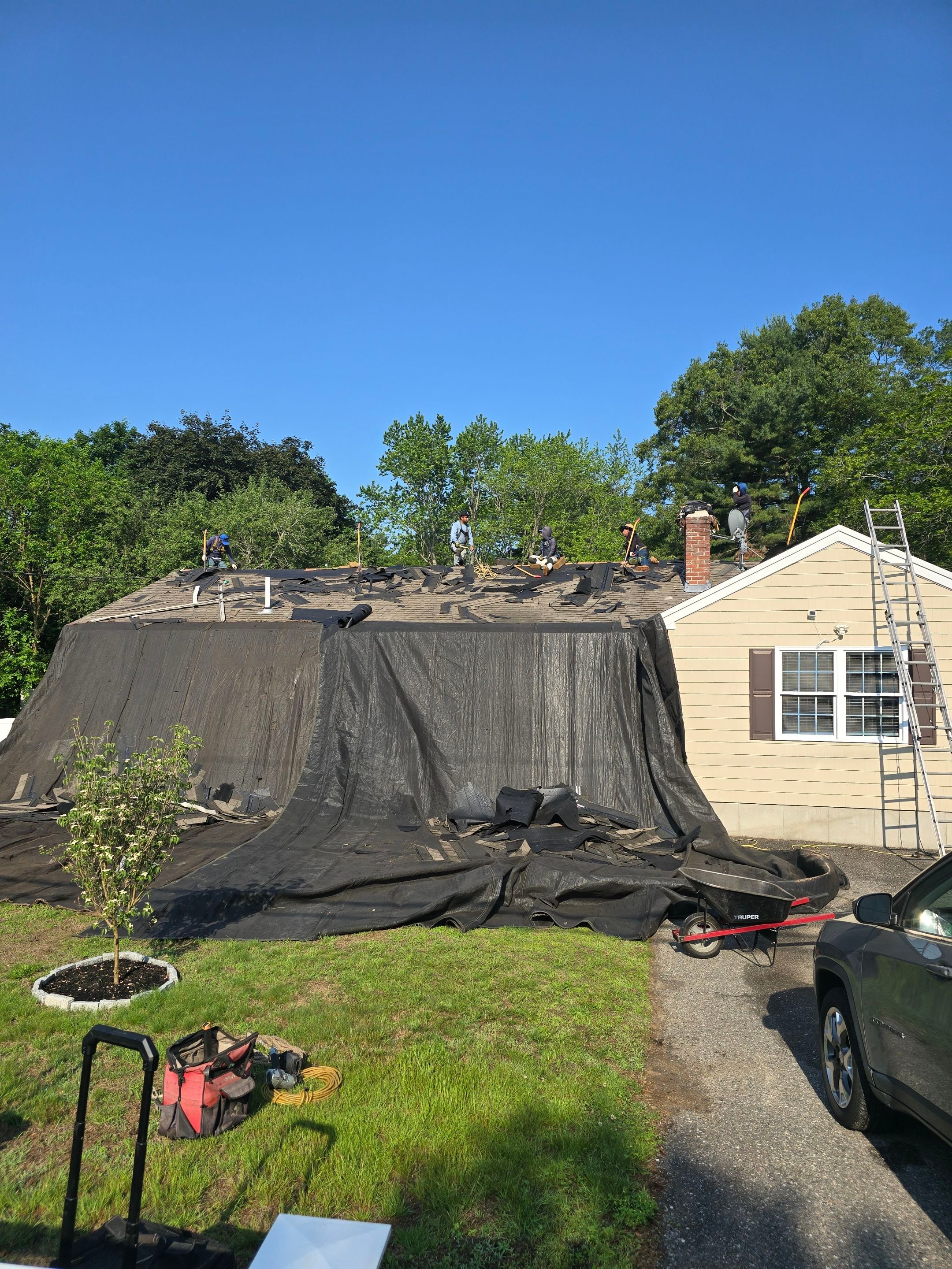 Full Roof Replacement & Chimney Repair – Onyx Black, MA by Mighty Dog Roofing of Greater Middlesex County