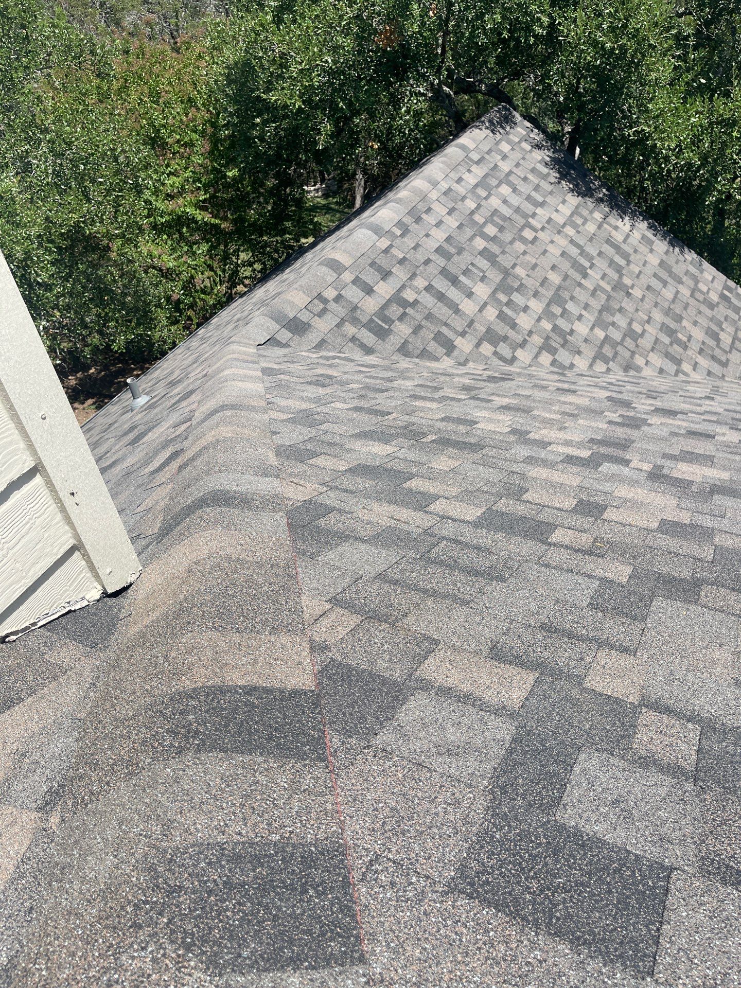 Residential Roofing Installation using IKO Dynasty Class 3 Driftshake by DeZign Roofing & Exteriors