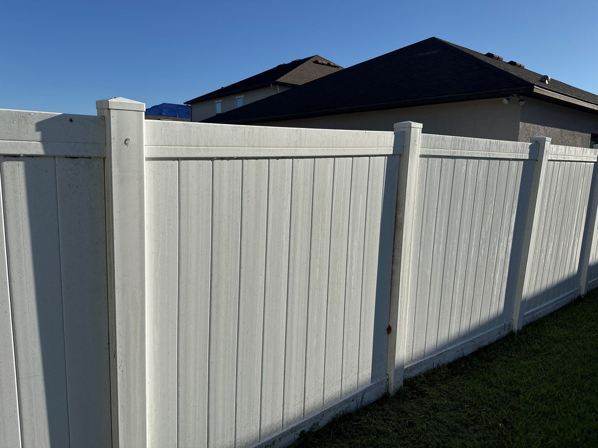 Comprehensive Concrete and Vinyl Fence Cleaning in Willow Walk Community, Palmetto, FL by Sunshine AquaWash