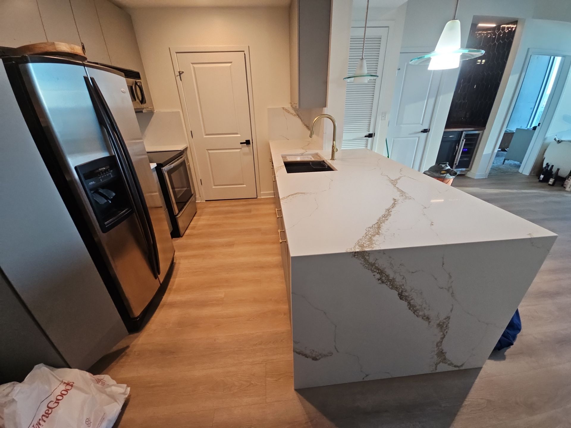 Dry Bar and Kitchen Countertop Conversion by Ajayi Design and Construction 