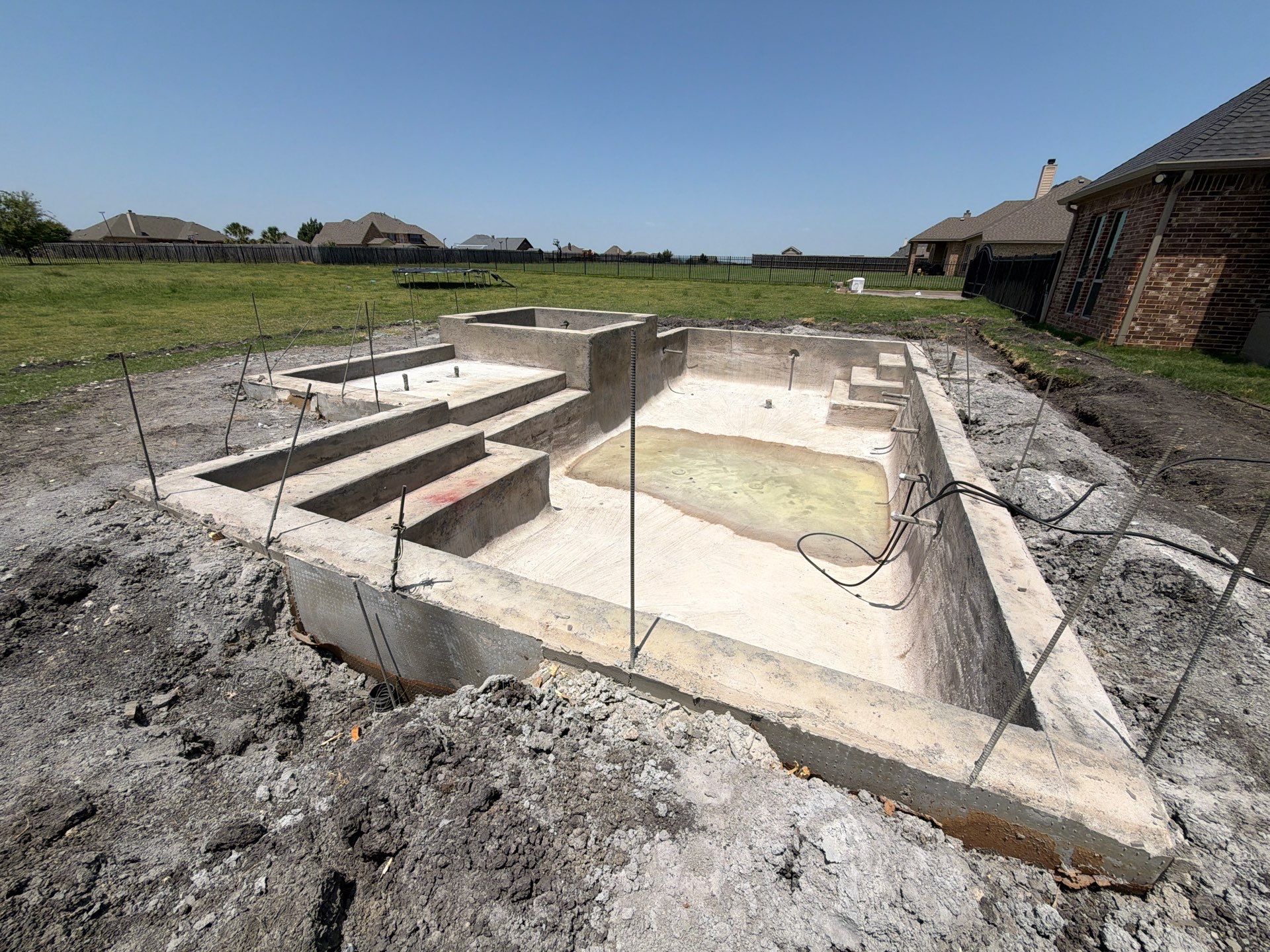Modern Geometric Pool with Raised Spa by Pinnacle Pools and Spas - DFW