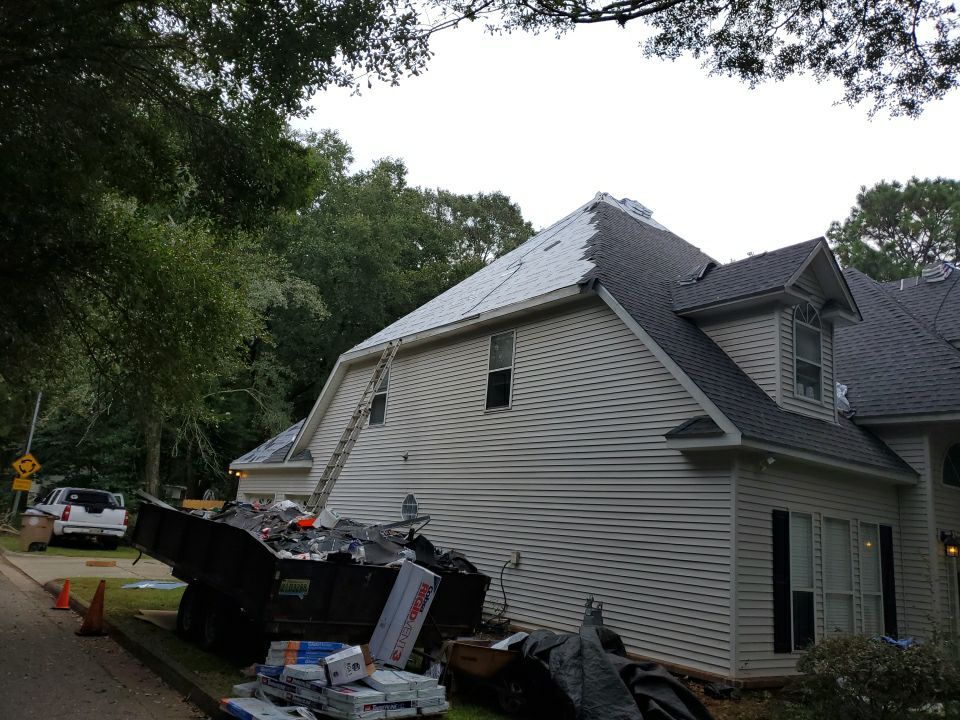Residential Roofing Installation using Roof Replacement by American Roofing & Construction LLC