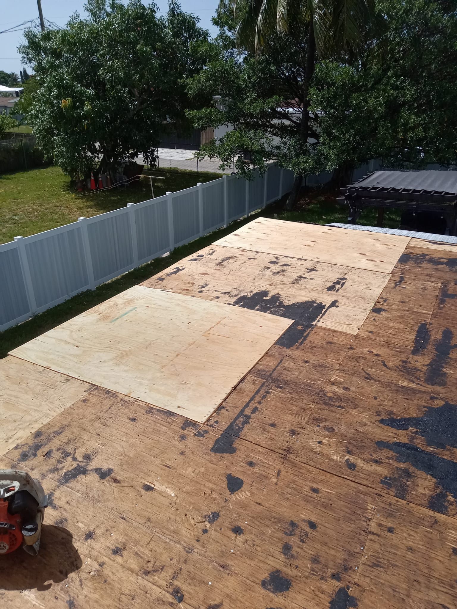 Standing Seam Metal & Flat Re-Roof using 1.5" Nail Strip 24ga Black Matte Kynar Coated Standing Seam Metal Panels by Morton Roofing, Inc.