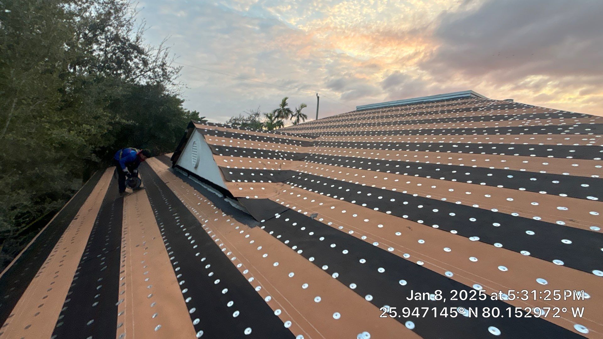 COMMERCIAL REROOF 24 GUAGE MEDIUM BRONZE 1-1/2" MECHANICAL SEAM "ZEBRA METHOD" by Earl W. Johnston Roofing 