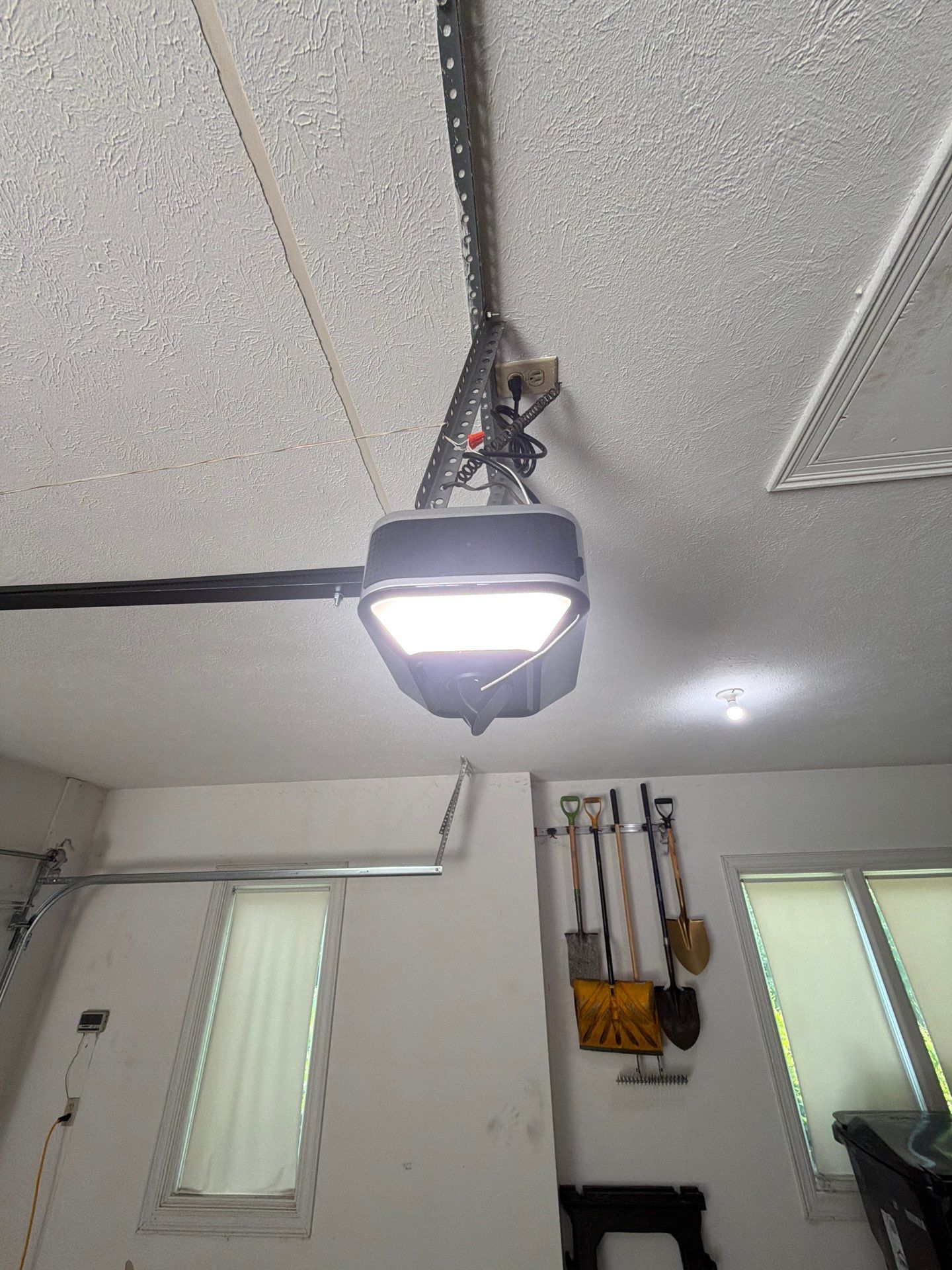 White Raised Panel Sectional Garage Door Installation in Solon by Ohio Garage Door Repair