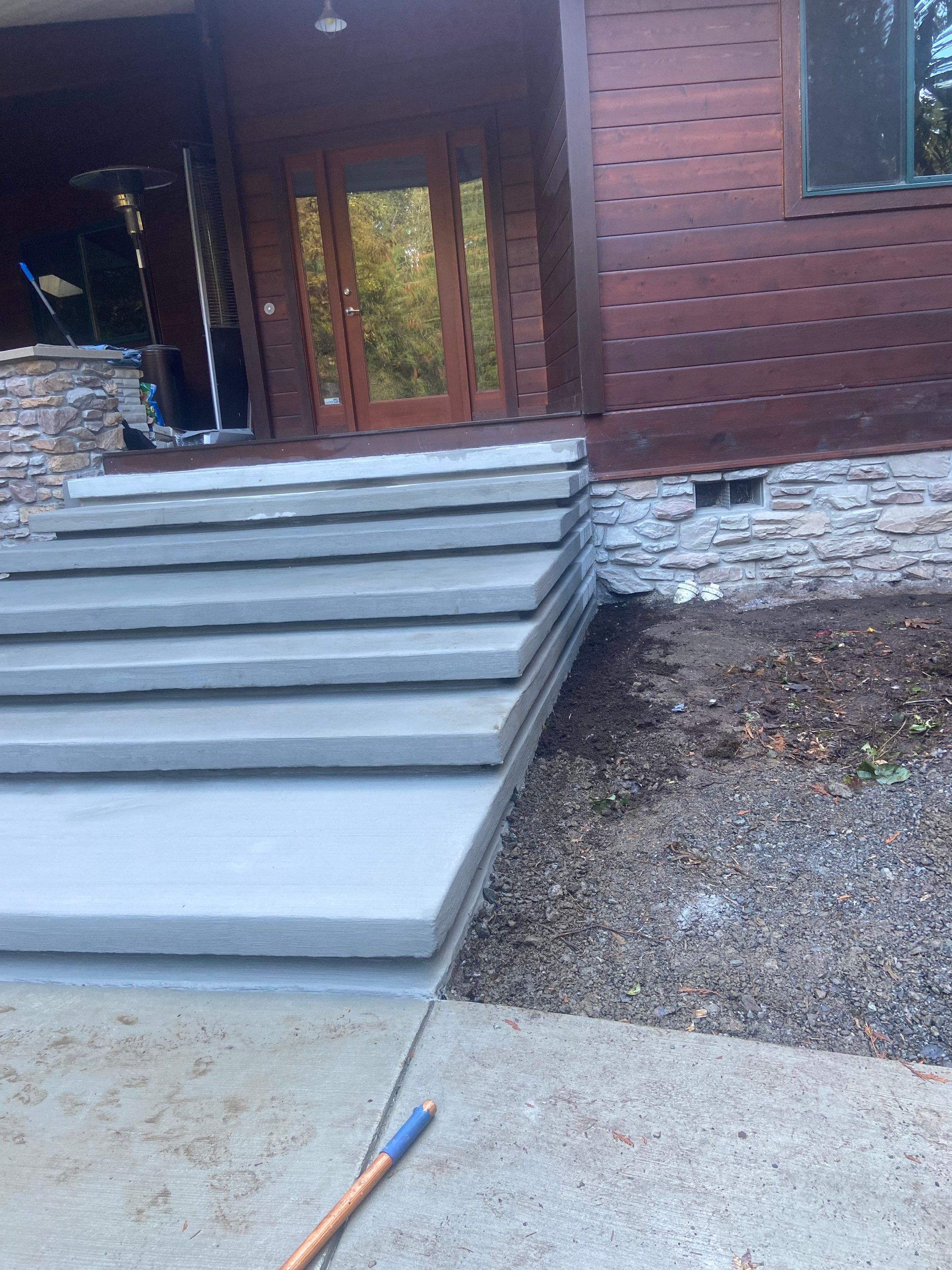 Pia | Custom Concrete Driveway, Walkway & Floating Steps by Jireh Asphalt & Concrete Inc 