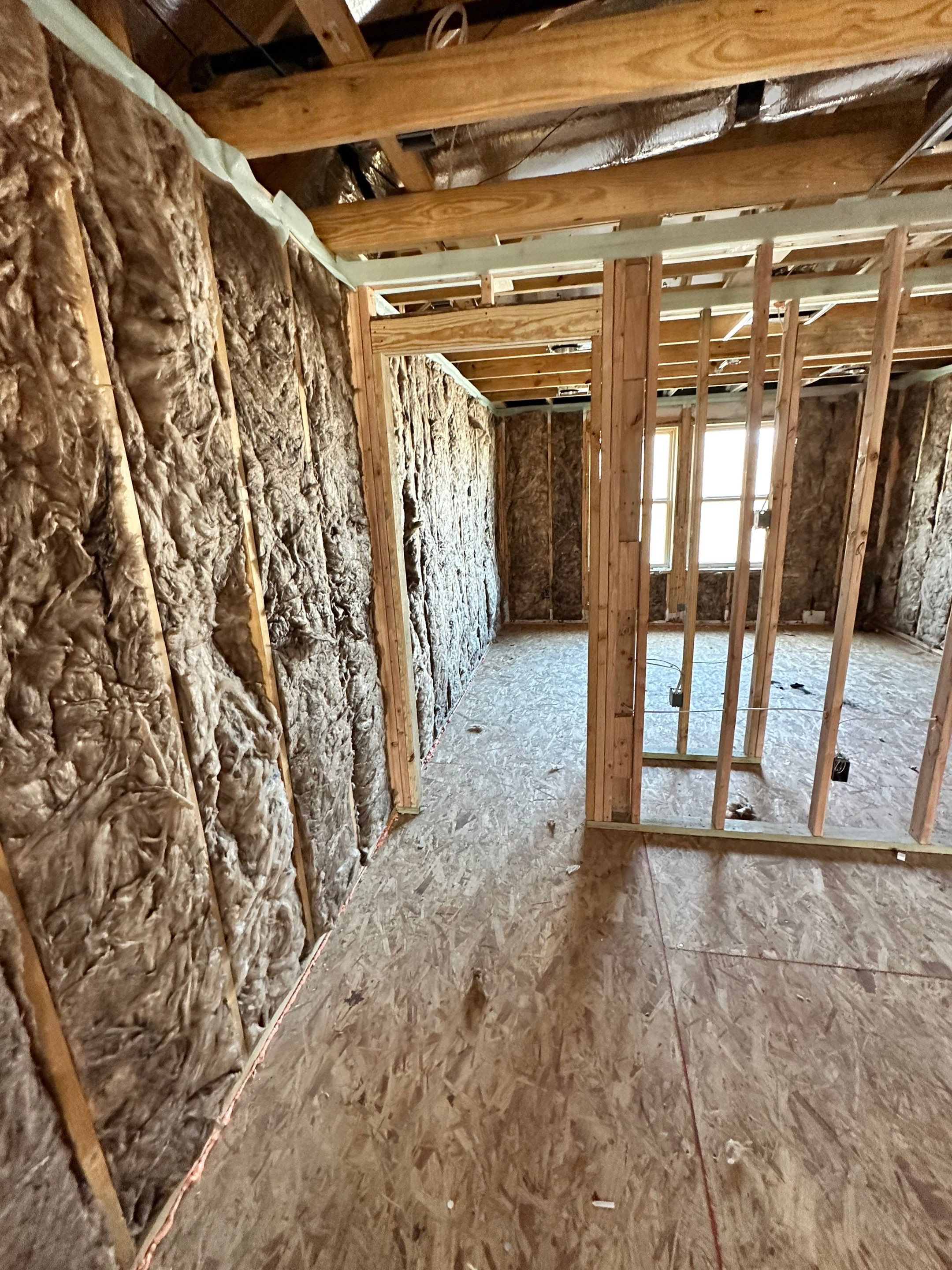 Fiberglass batt install on new construction home in Ft Worth by Apex Insulation Solutions