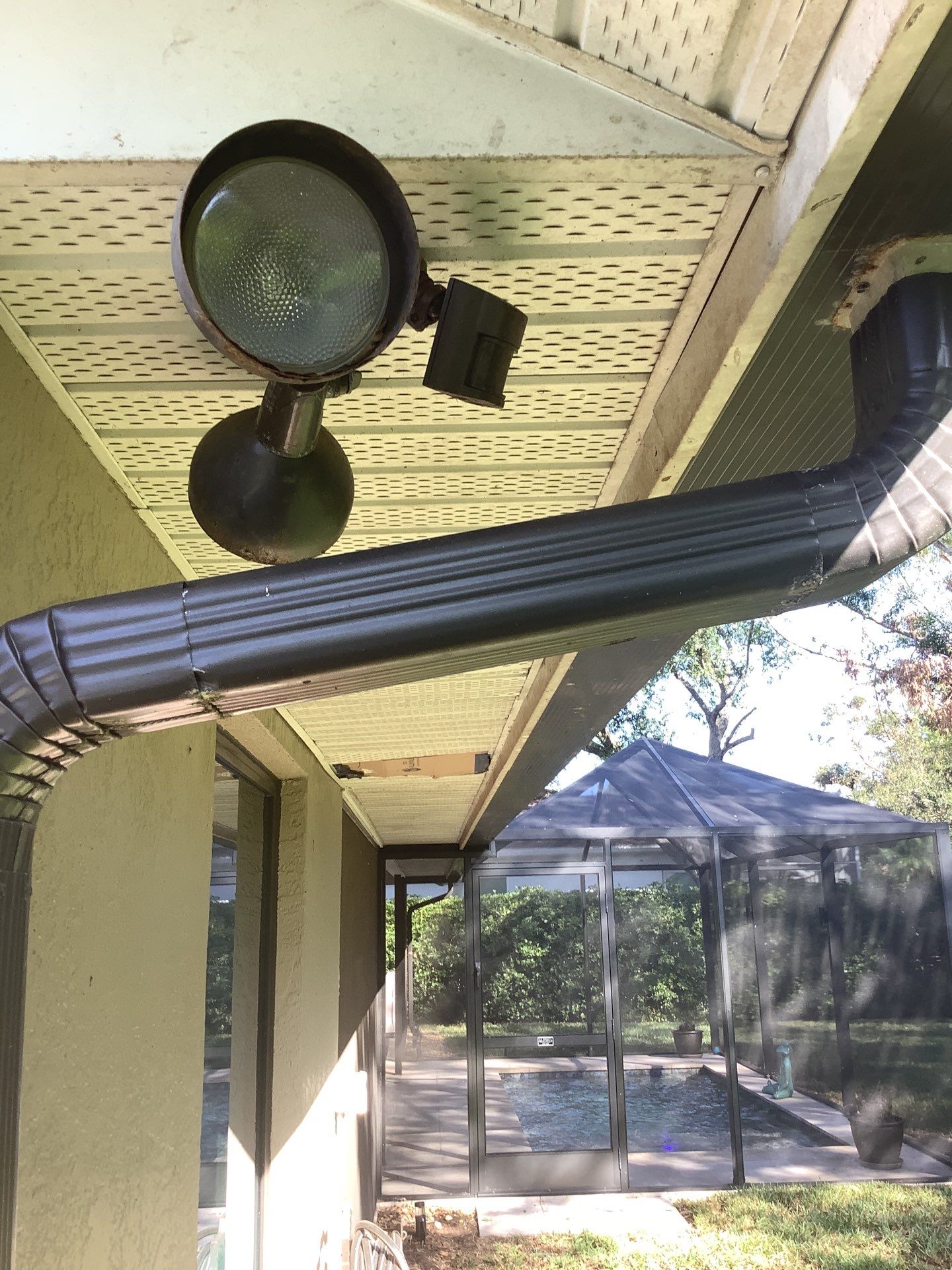 Black Seamless Gutters in Sarasota FL by Gutter Professors