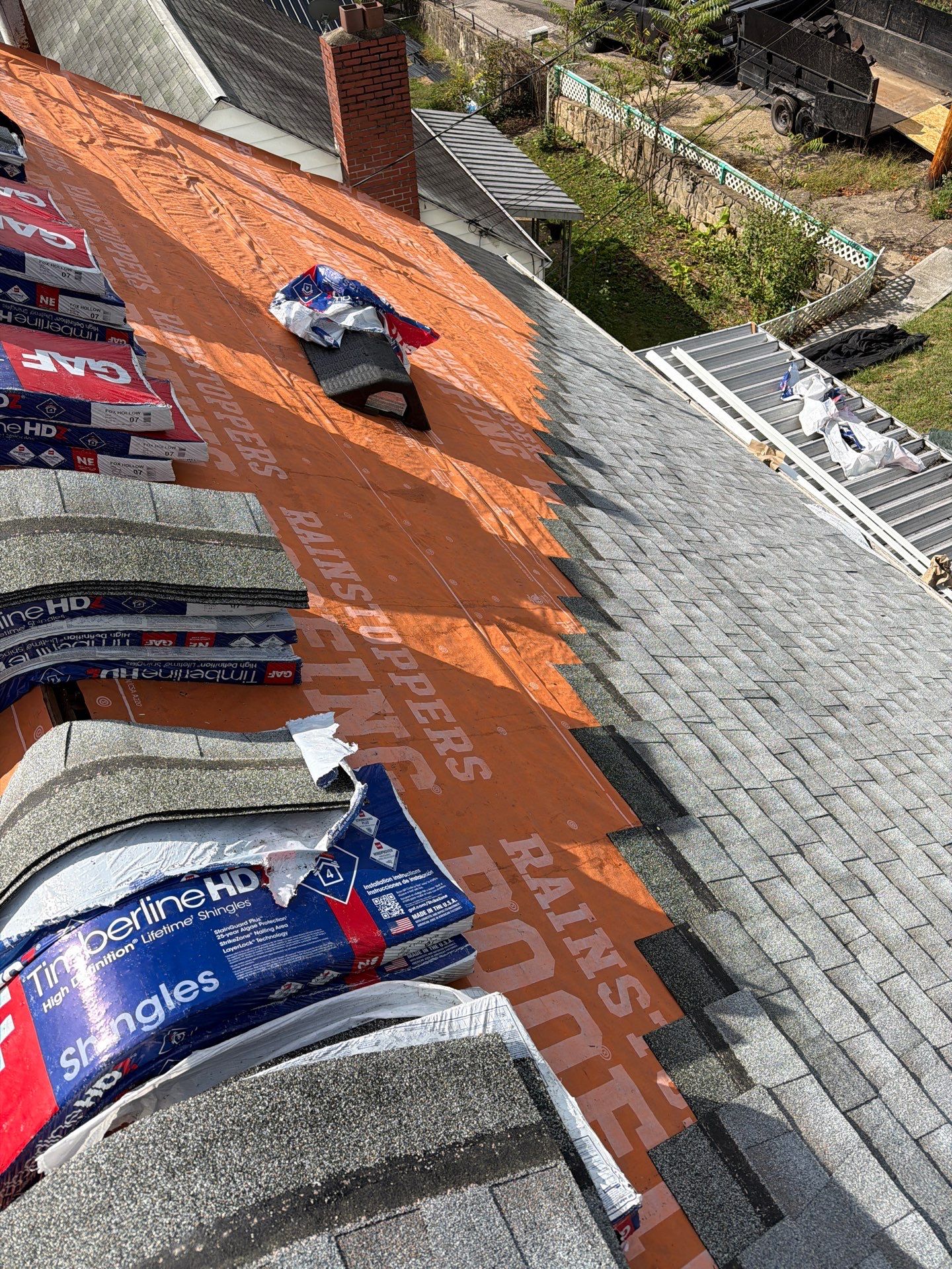 Residential Roofing Installation using GAF Timberline HDZ Fox Hollow Grey by Rainstoppers Roofing
