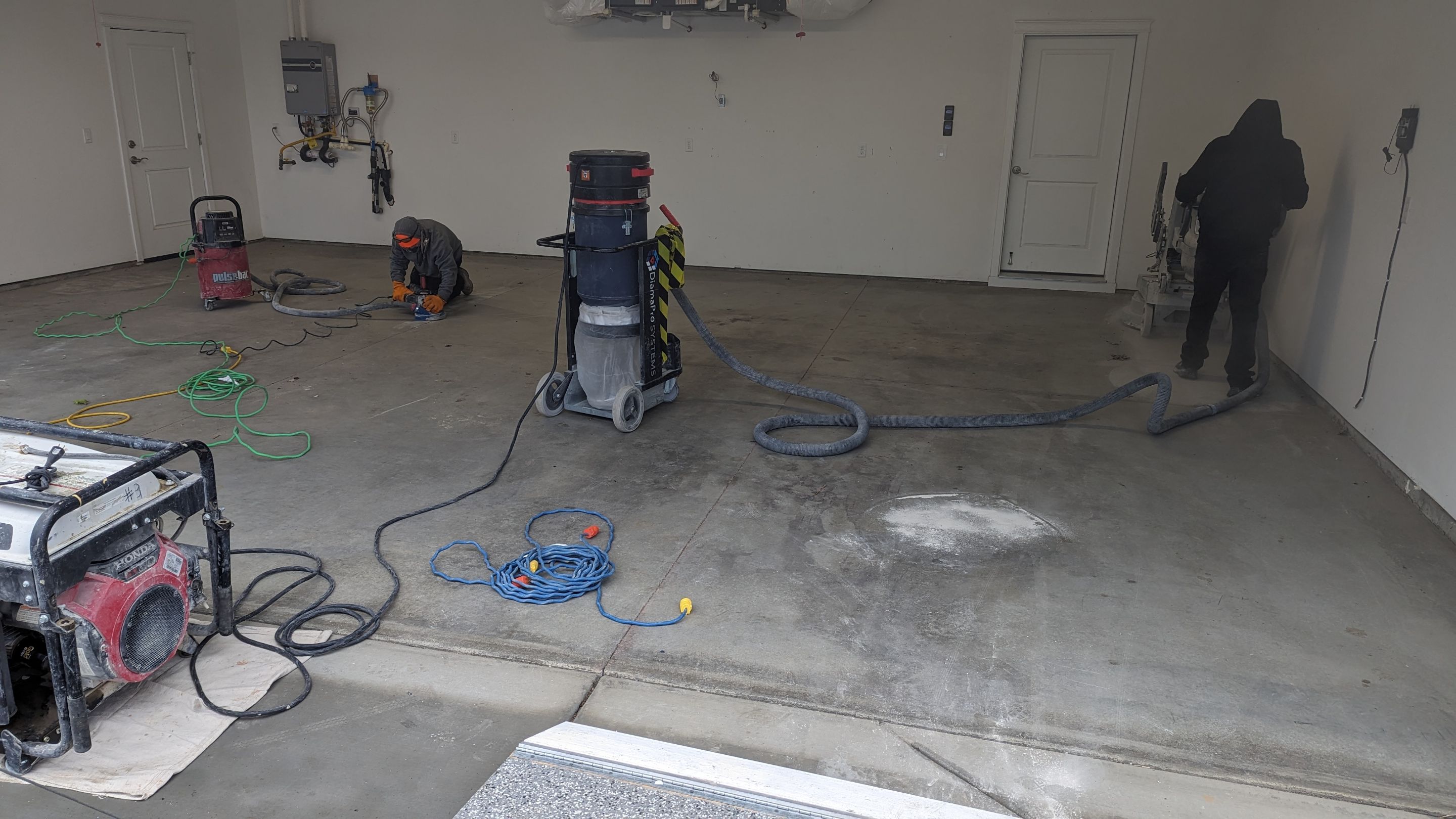 Garage Transformation using Domino with Blue by Croc Coatings, LLC
