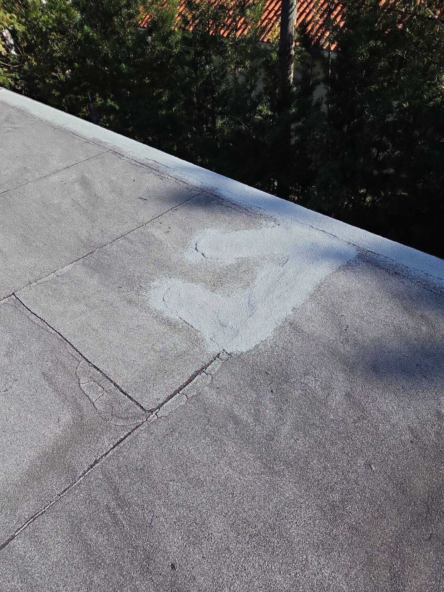 Commercial Flat Roof Restoration Using Silicone Coating in Hallandale Beach by Aastro Roofing
