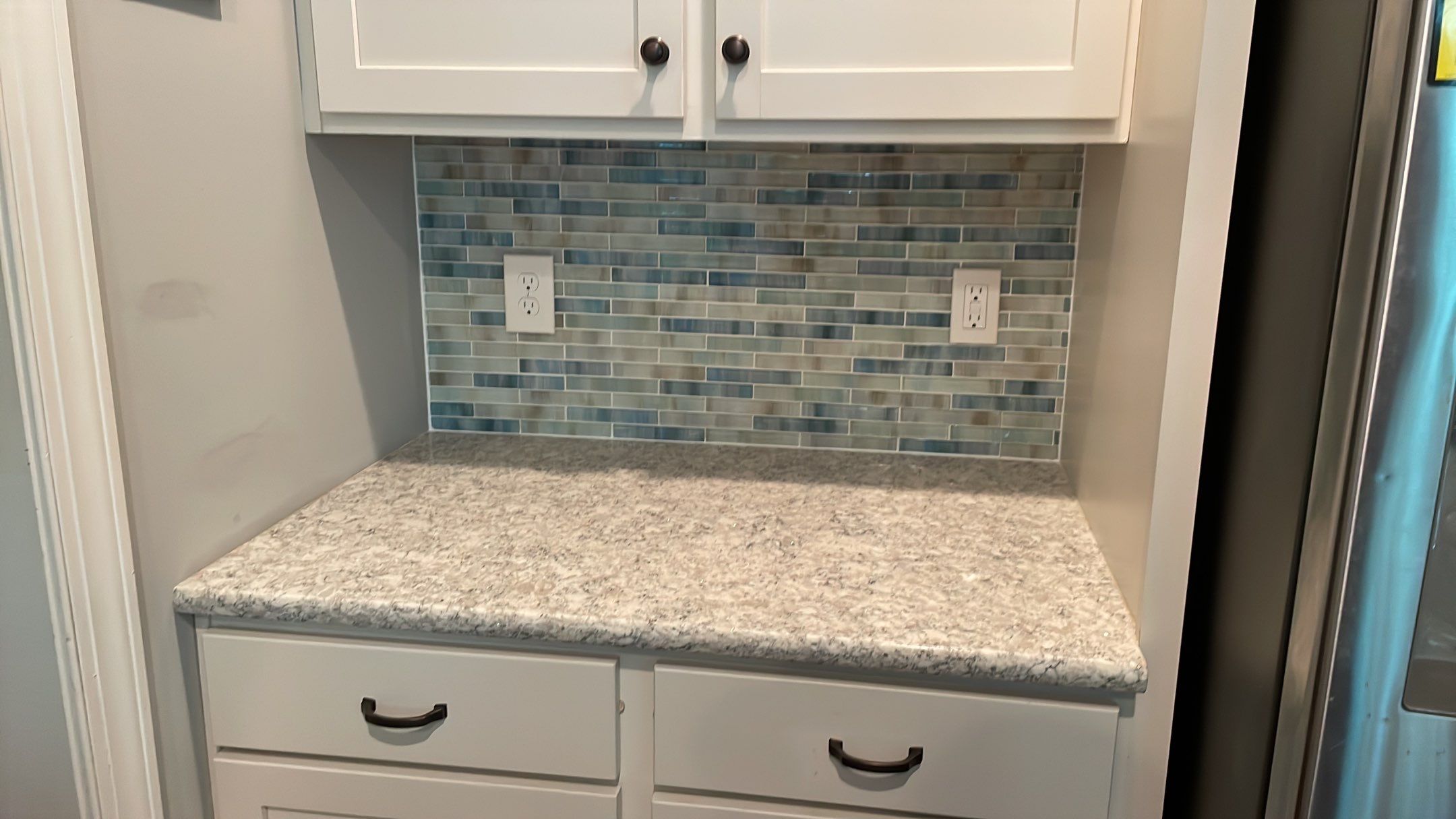 Updated Backsplash by Footprints Floors of Coastal Carolina