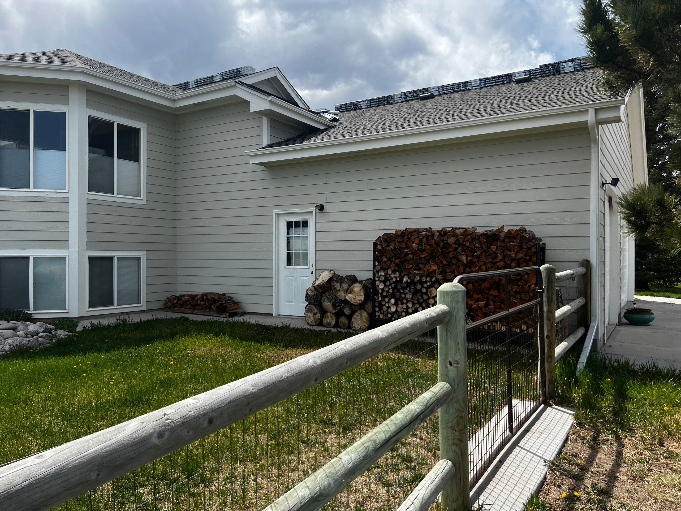 Residential Roofing Installation using Atlas Pinnacle Impact Weathered Wood by Blue Peaks Roofing LLC 