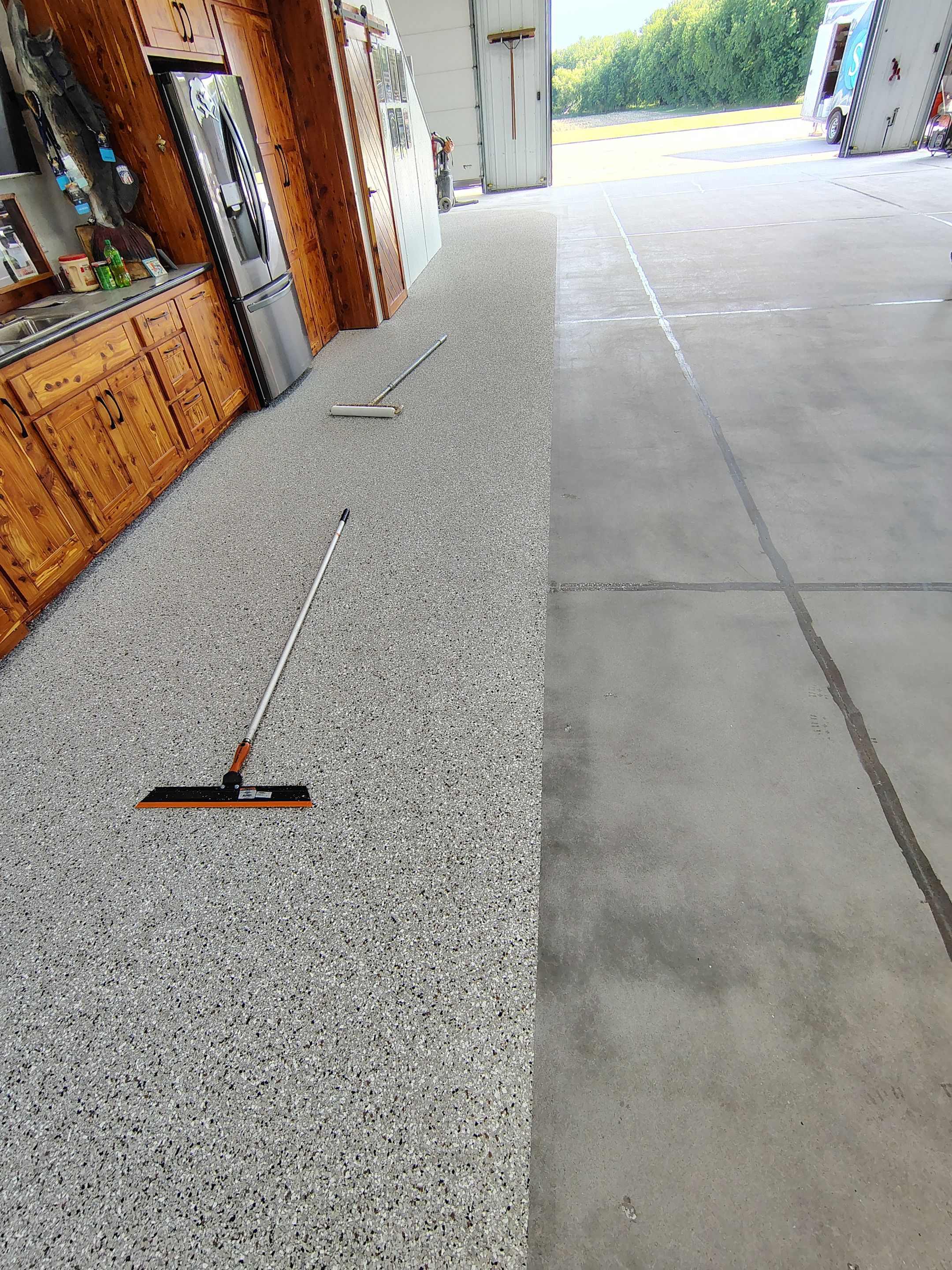 Multi-Stage Concrete Floor Coating for Egan Shop and RV Storage by Select Painting, Coatings & Garage Cabinets