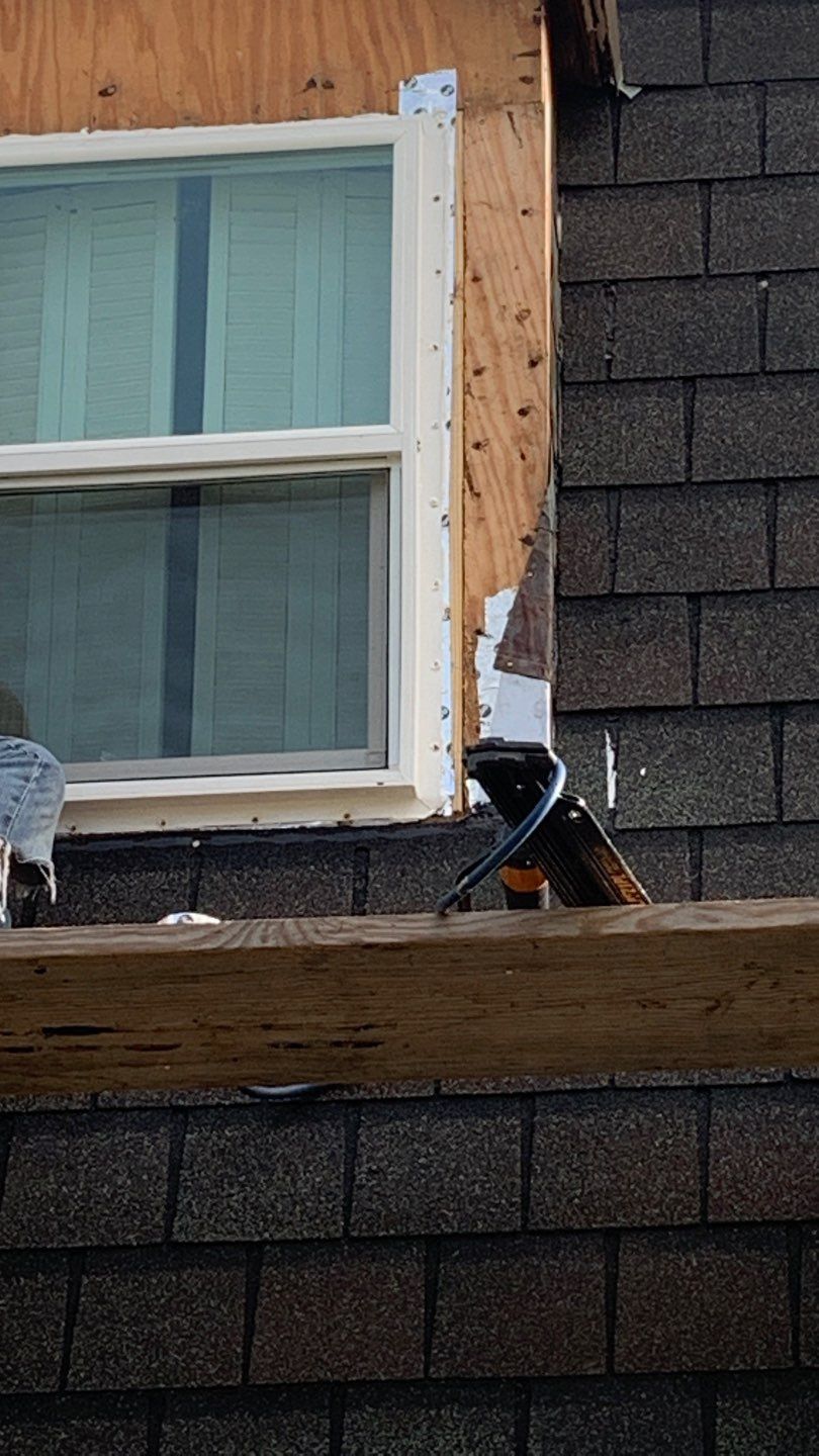 Mansard Charm by Bayfront Roofing and Construction