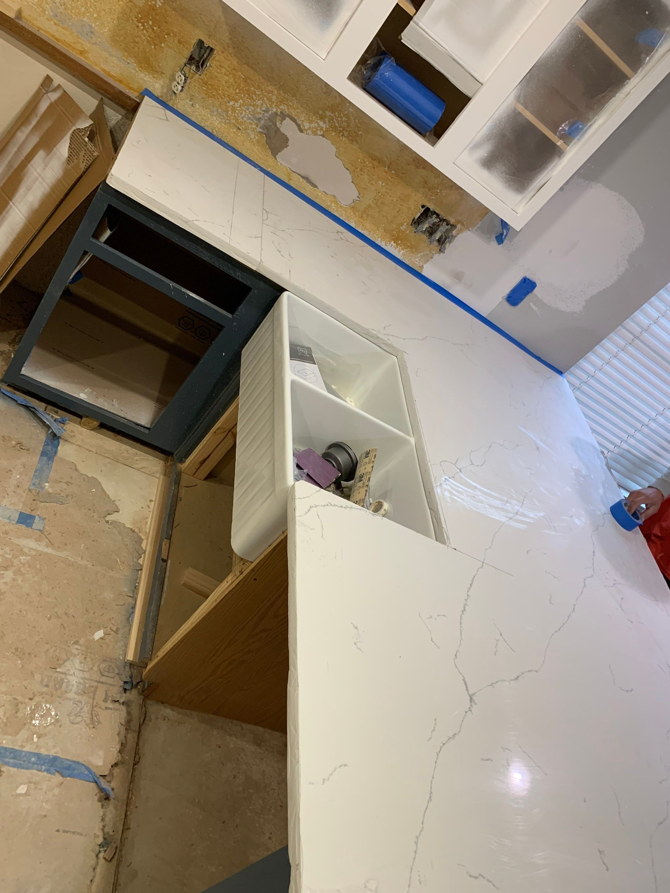 Modern Kitchen Remodel with Blue Cabinetry by Majesty Construction