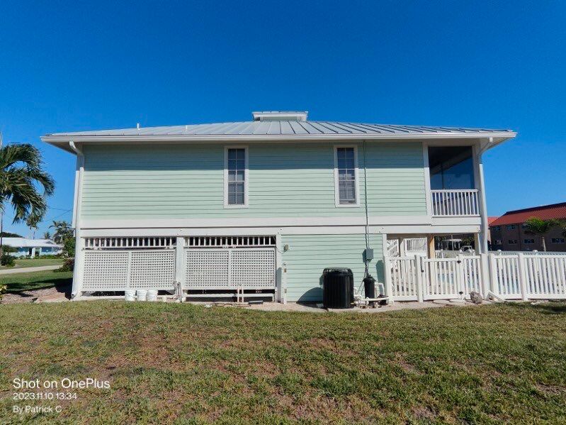3x4 elbow Downspouts in Sanibel FL by Gutter Professors