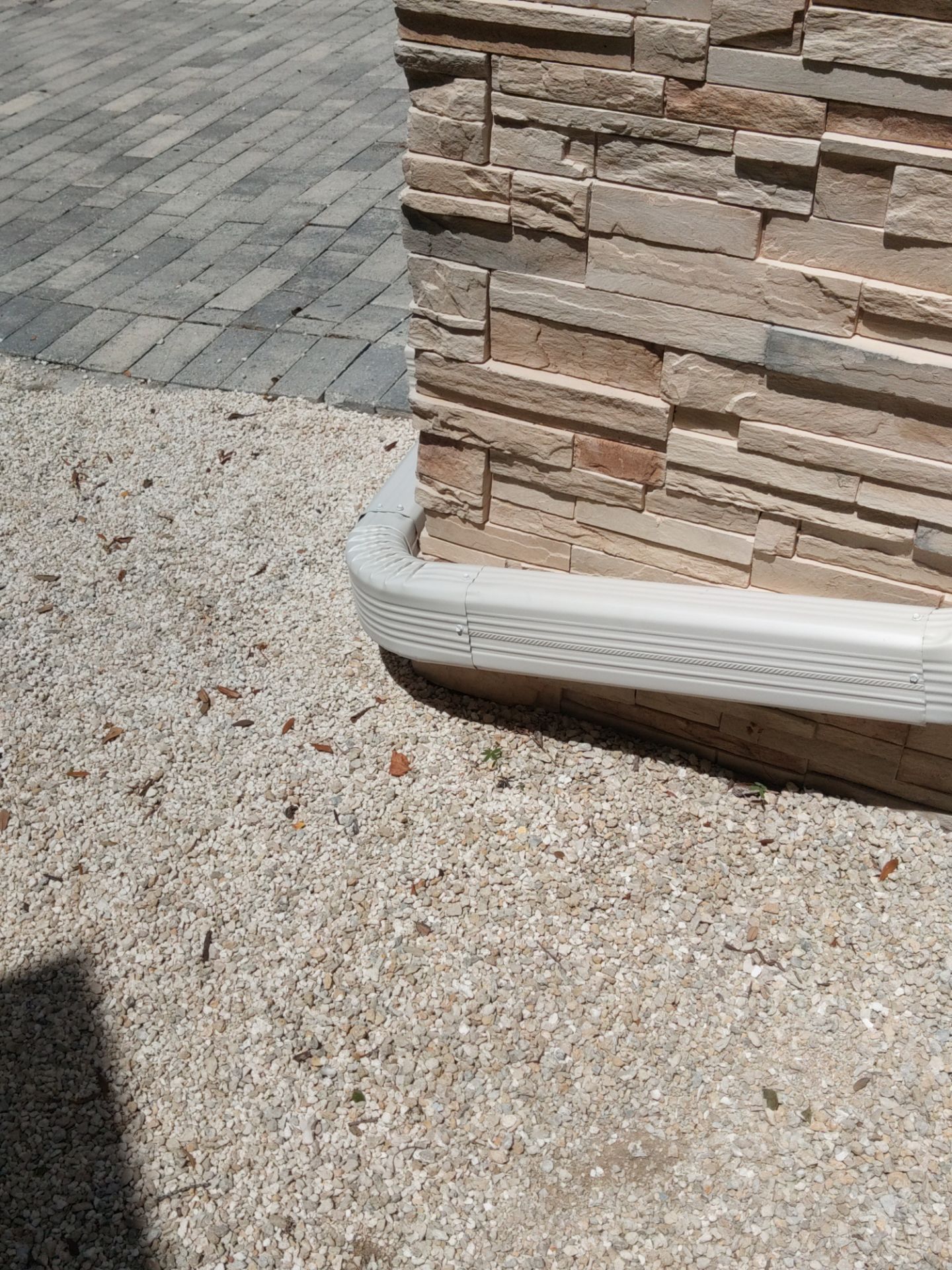 Bronze Gutters and Almond Downspouts in Longboat Key FL by Gutter Professors