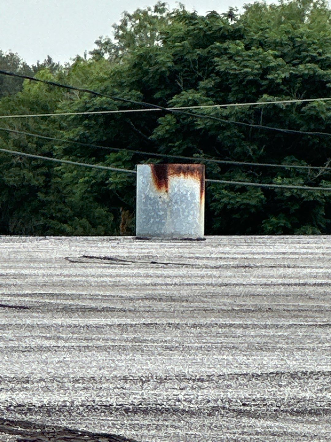 Commercial Silcone Roof Repair using Silcone Coating by Galvan Roofing and Construction