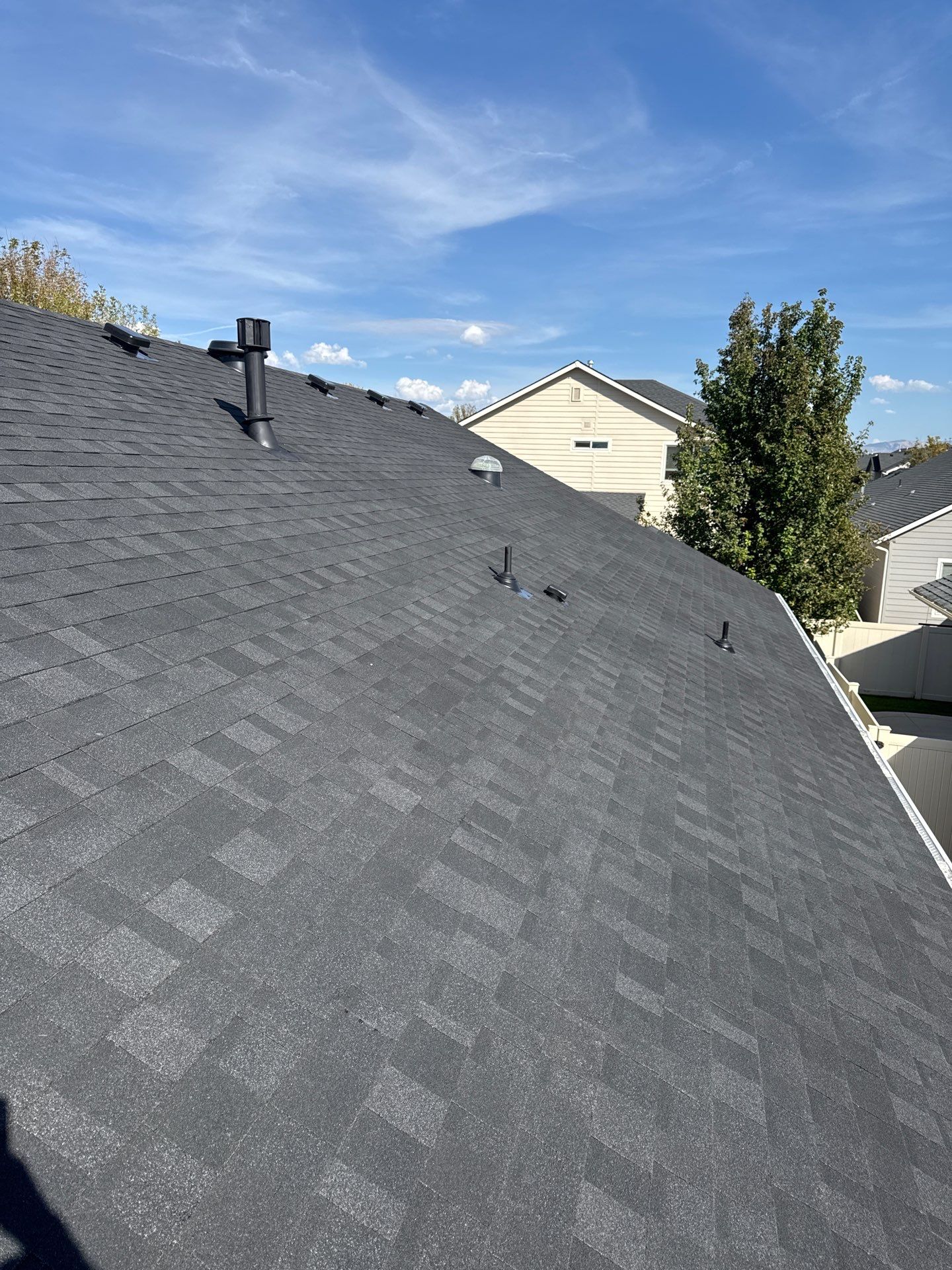 Residential Roof Replacement With Charcoal Architectural Shingles in Meridian by Olive Roofing
