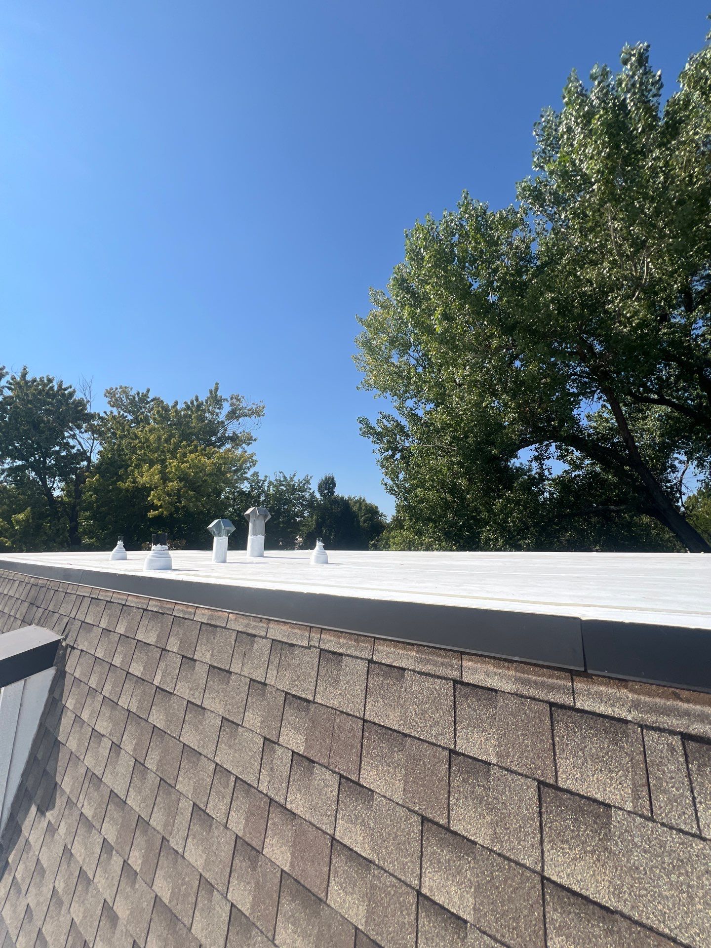 TPO Flat Roof Replacement in Edmond, OK by McCann's Roofing and Construction
