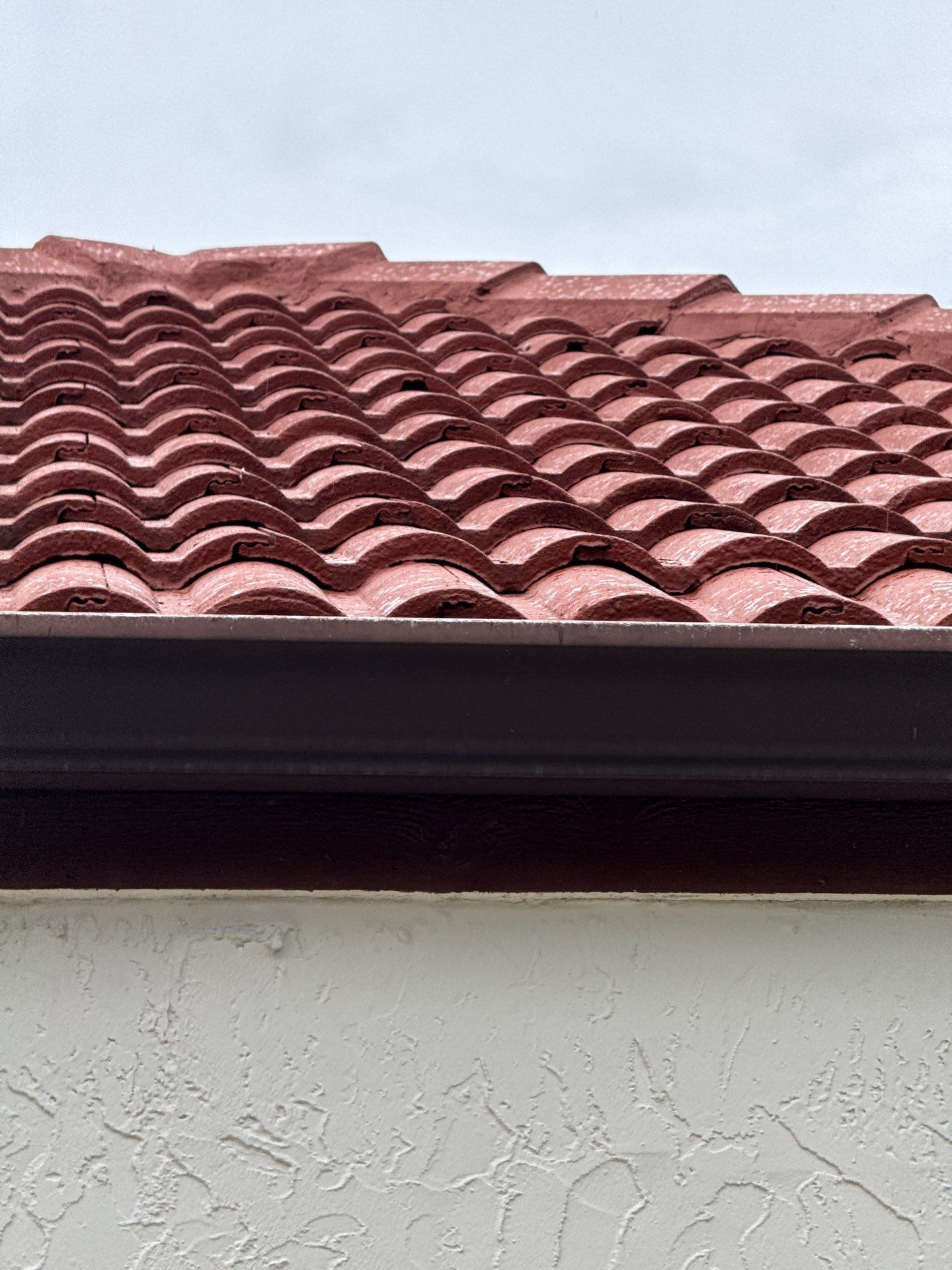 Residential Tile Roof Replacement and Gutter Installation in Winter Park by Pinnacle Roofing Group