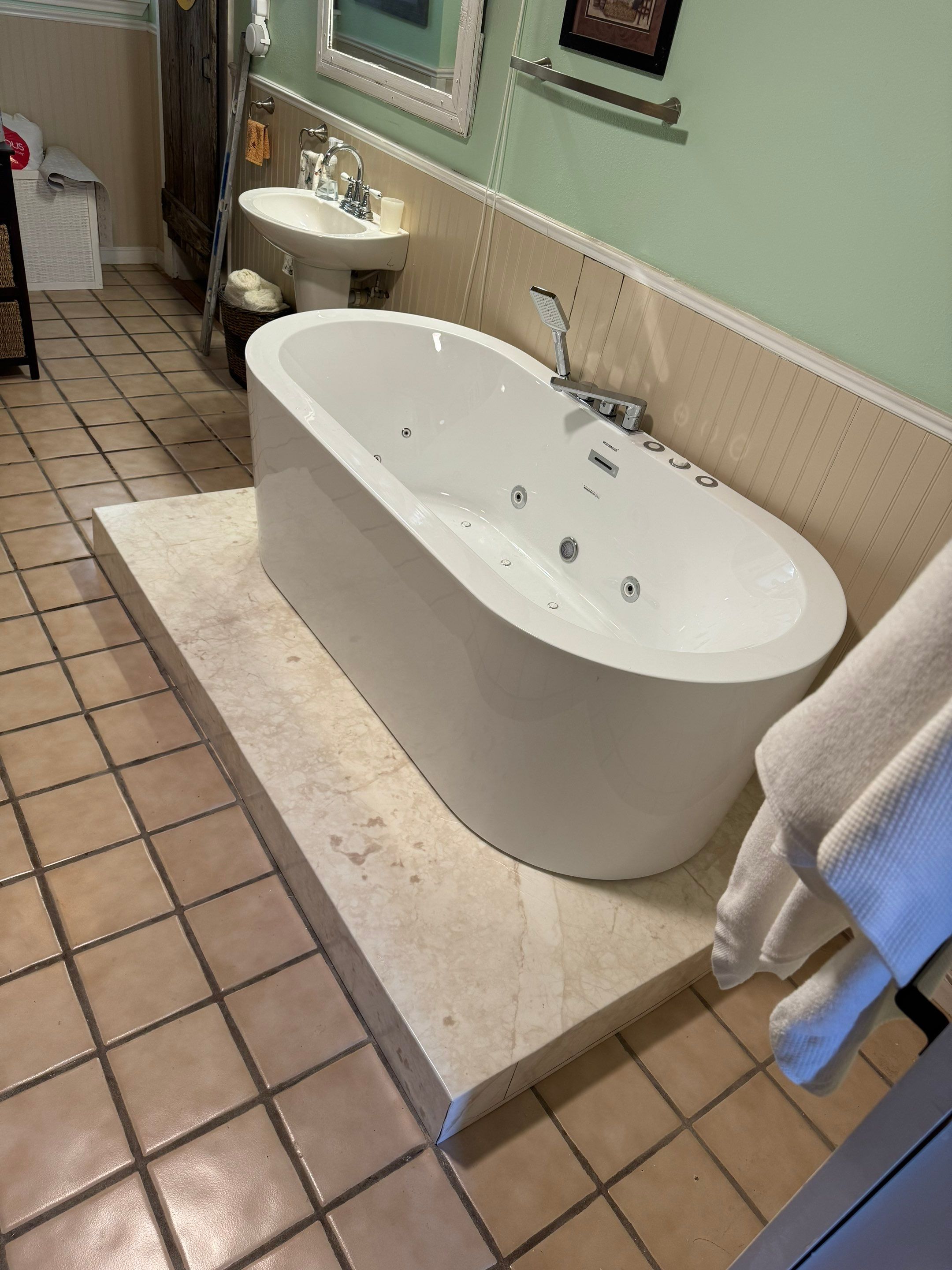 Tub to walk in shower and new free-standing tub in Canyon Lake by Lane Lauritsen - The Hill Country, Texas
