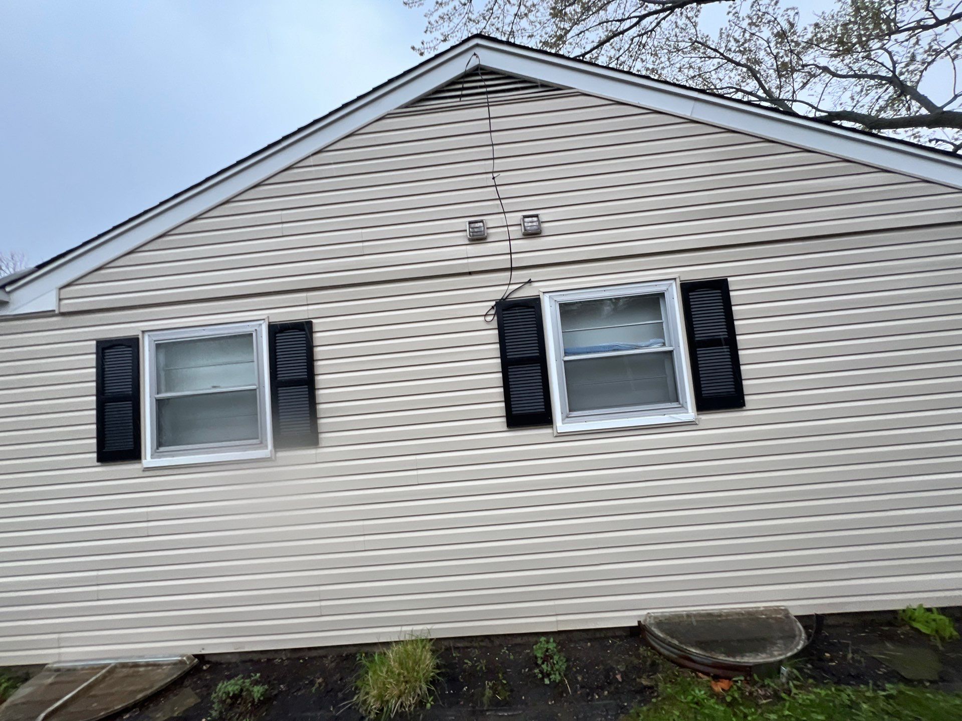 Housewashing  using Algaecide, soft wash soap by Northern Power Washing LLC.