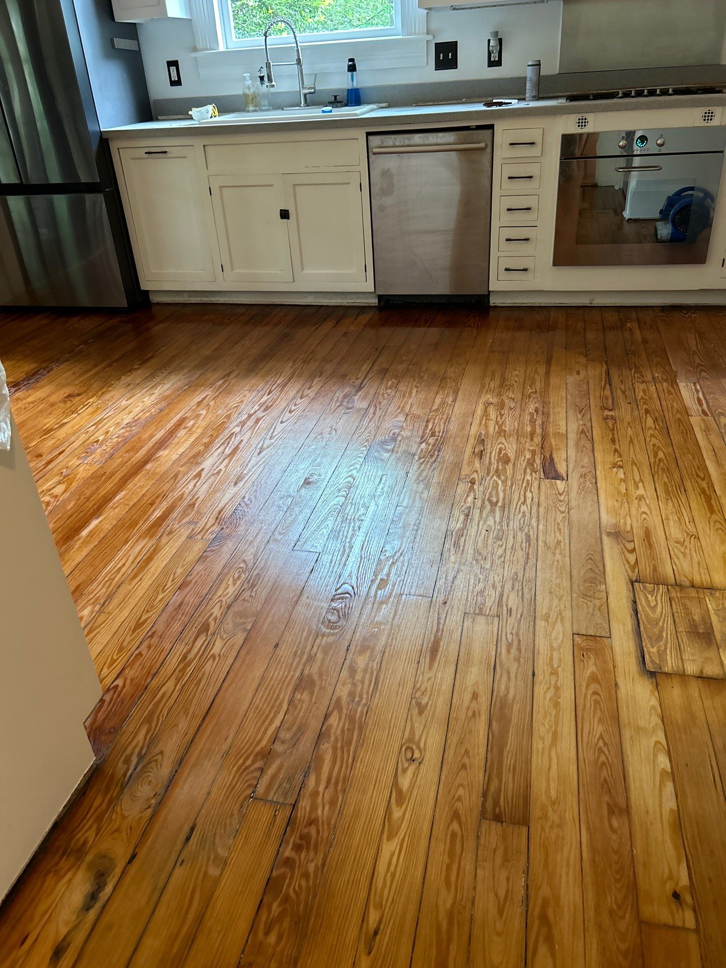 We restored this painted heart pine! by Footprints Floors of East Atlanta