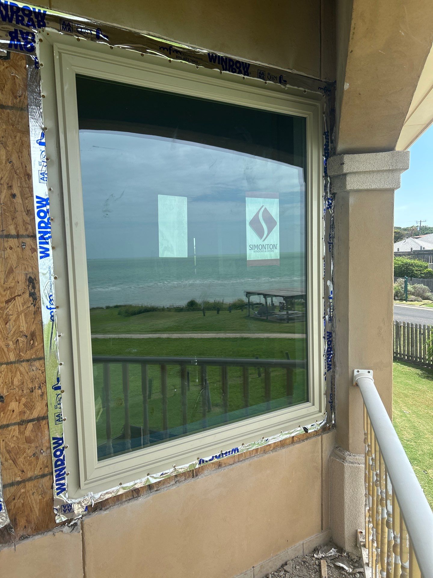 Beauty by the Bay by Bayfront Roofing and Construction