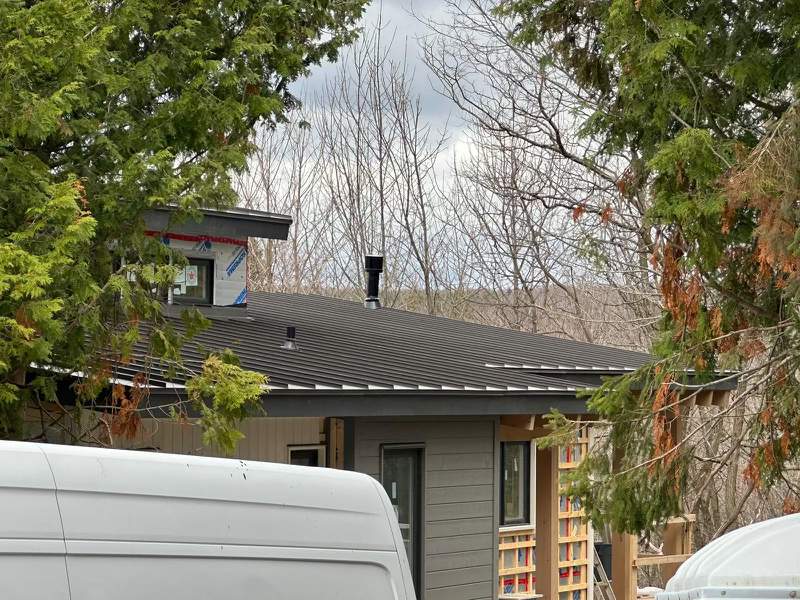 Residential Roofing Installation using 24 Ga Standing Seam Metal by Jay Carter Roofing & Sheet Metal