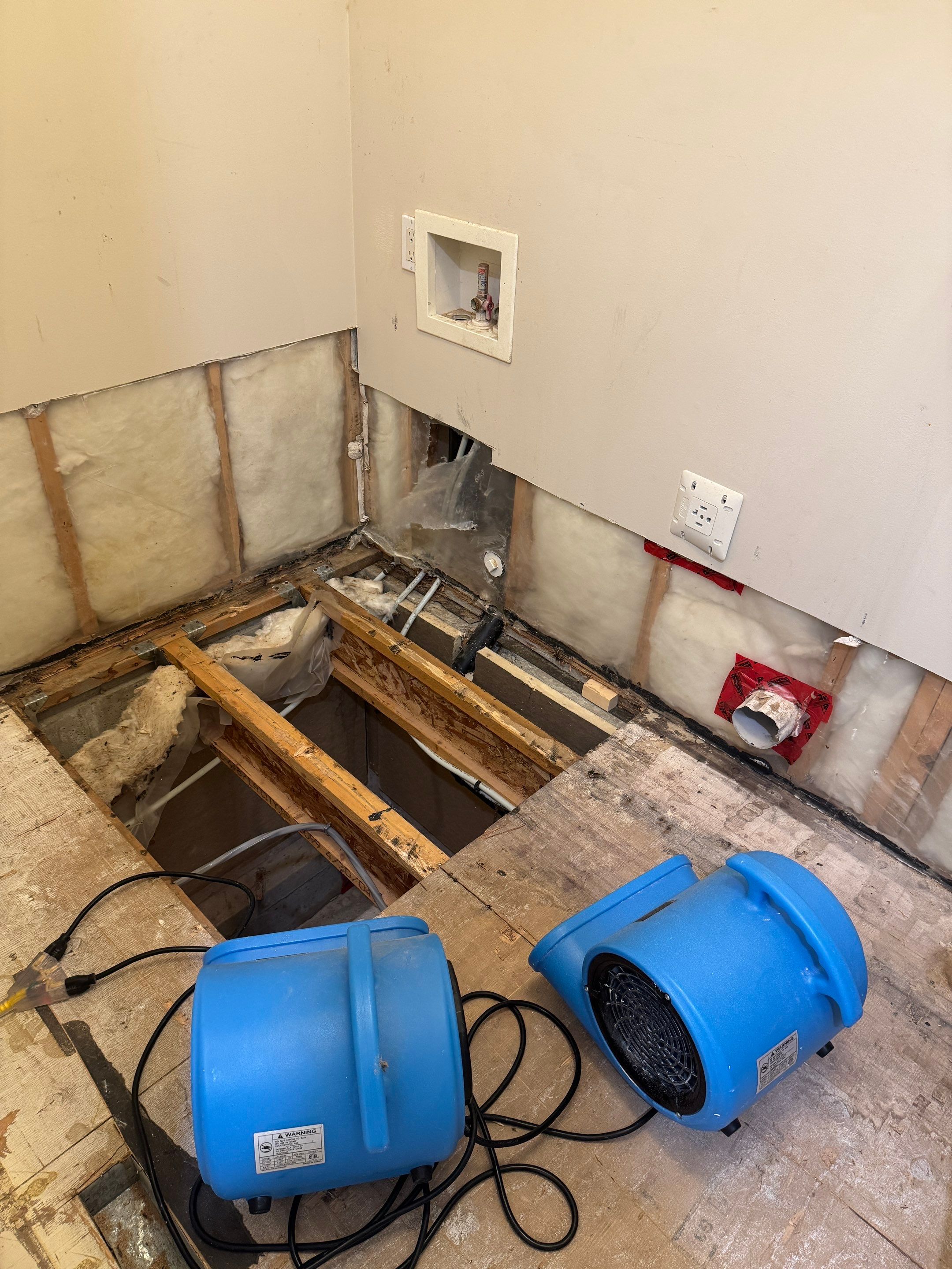 High-End Laundry Room Renovation and Restoration in Vancouver by YVR Construction Group