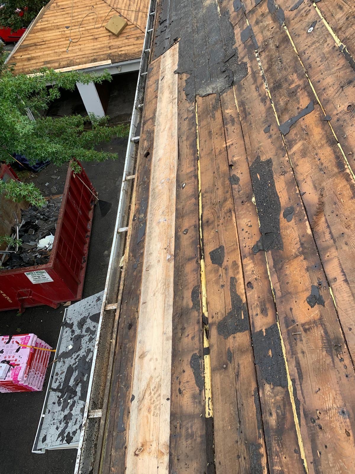 Roof Replacement with Skylight Flashing in Waltham, MA by Mighty Dog Roofing of Greater Middlesex County