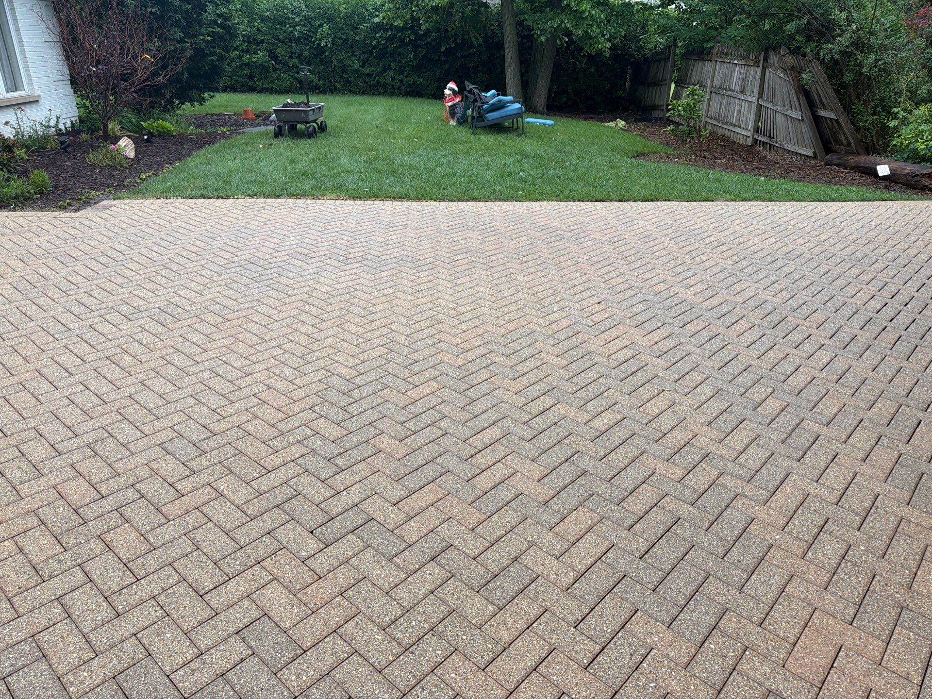 Brick paver repair, cleaning and sealing by Northern Power Washing LLC.