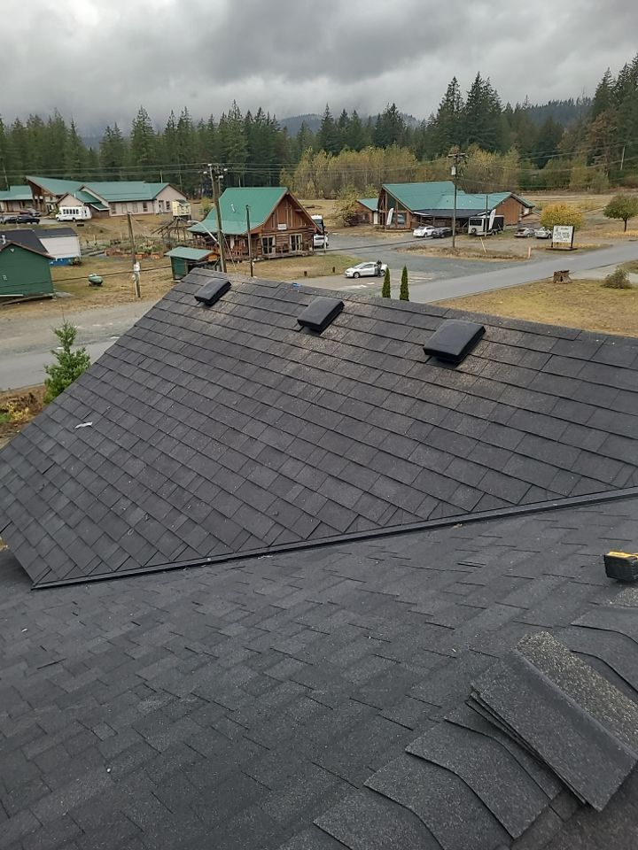 Residential Roofing Installation using OC Oakridge shingles by Top Notch Roofing Inc