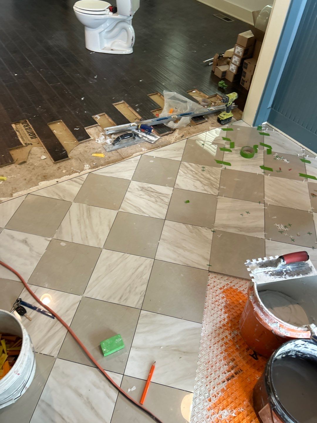White Oak Hardwood and Checkerboard Tile Installation by Footprints Floors of Nashville