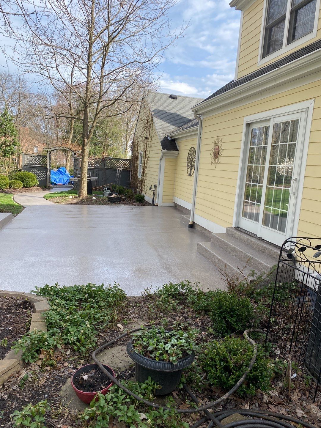 Large Patio + Garage Project in Pittsburgh by Floors in a Day, Inc
