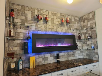 Glass Shelving Installation using 1/4 clear glass with glass brackets