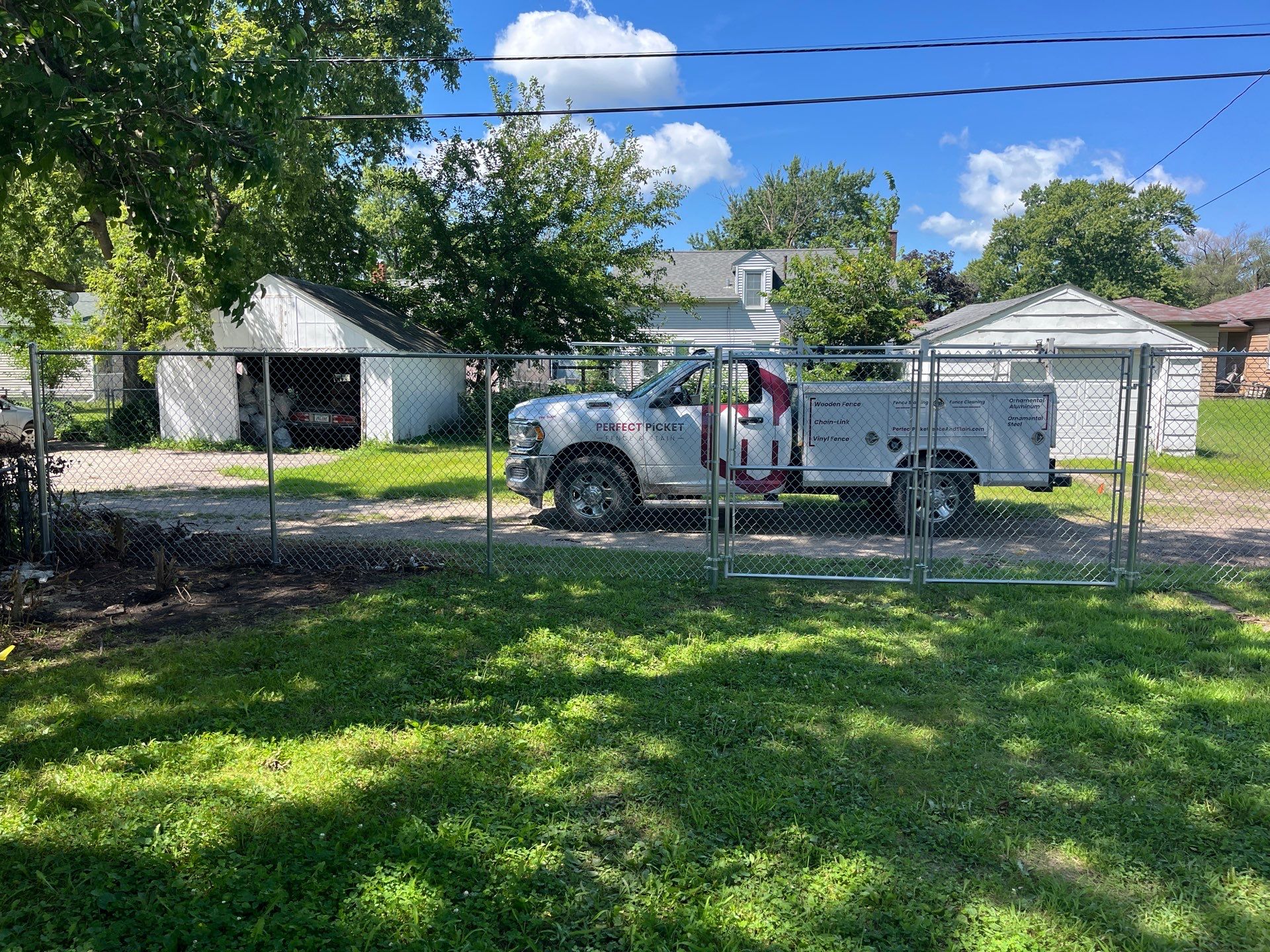 Galvanized Chain Link Fence Installation and Site Clearing in Waterloo by Perfect Picket Fence and Stain