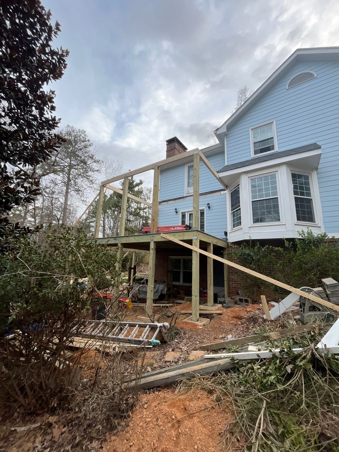 New deck with screened in porch by Nelson Exteriors 