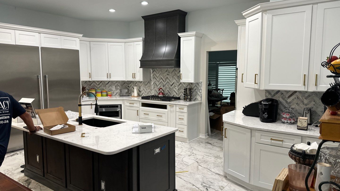 Luxury White Kitchen Remodel in The Dominion Featuring Custom Cabinetry and Marble Finishes by Legacy Bath and Kitchen 