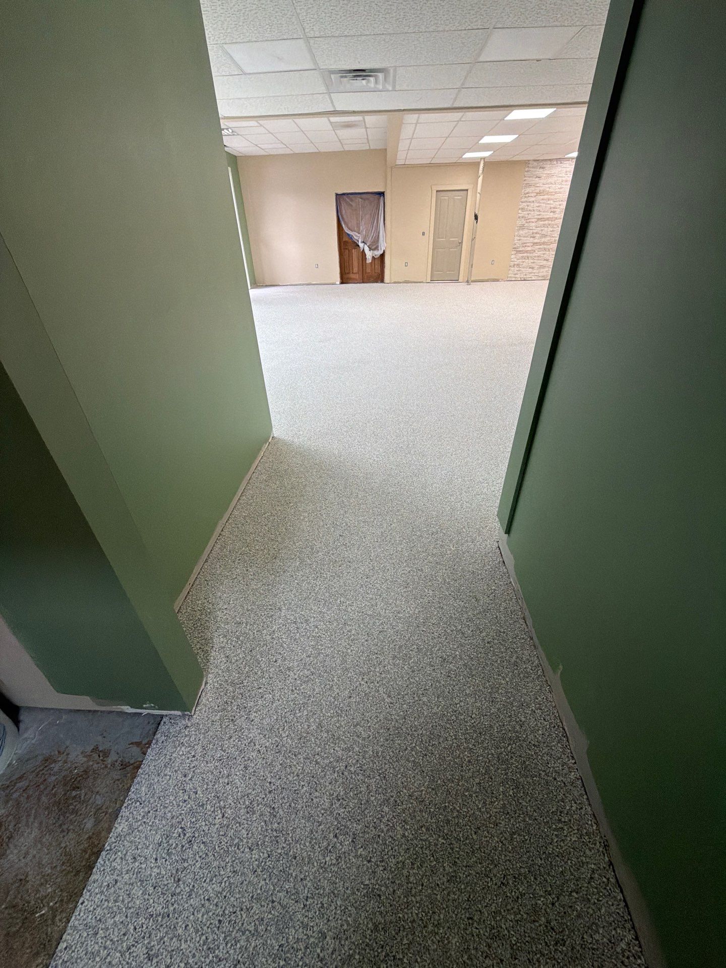 Commercial Epoxy Flake Floor Installation and Concrete Refinishing in Montague by Gordon Painting