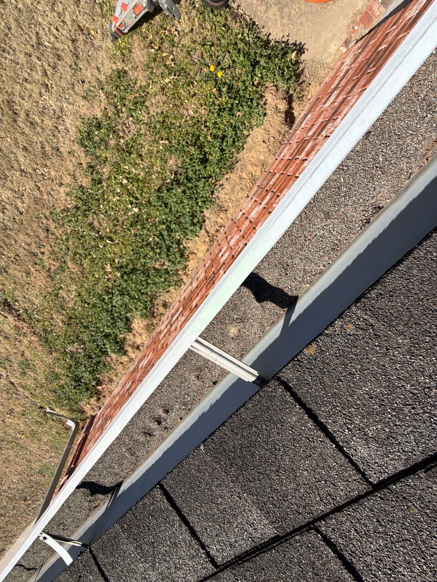 Black roof & gutters!! by In & Out Construction & Remodeling, LLC
