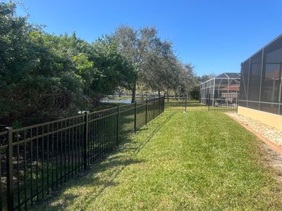Aluminum Fence Installation using Black 3 Rail Aluminum Fence